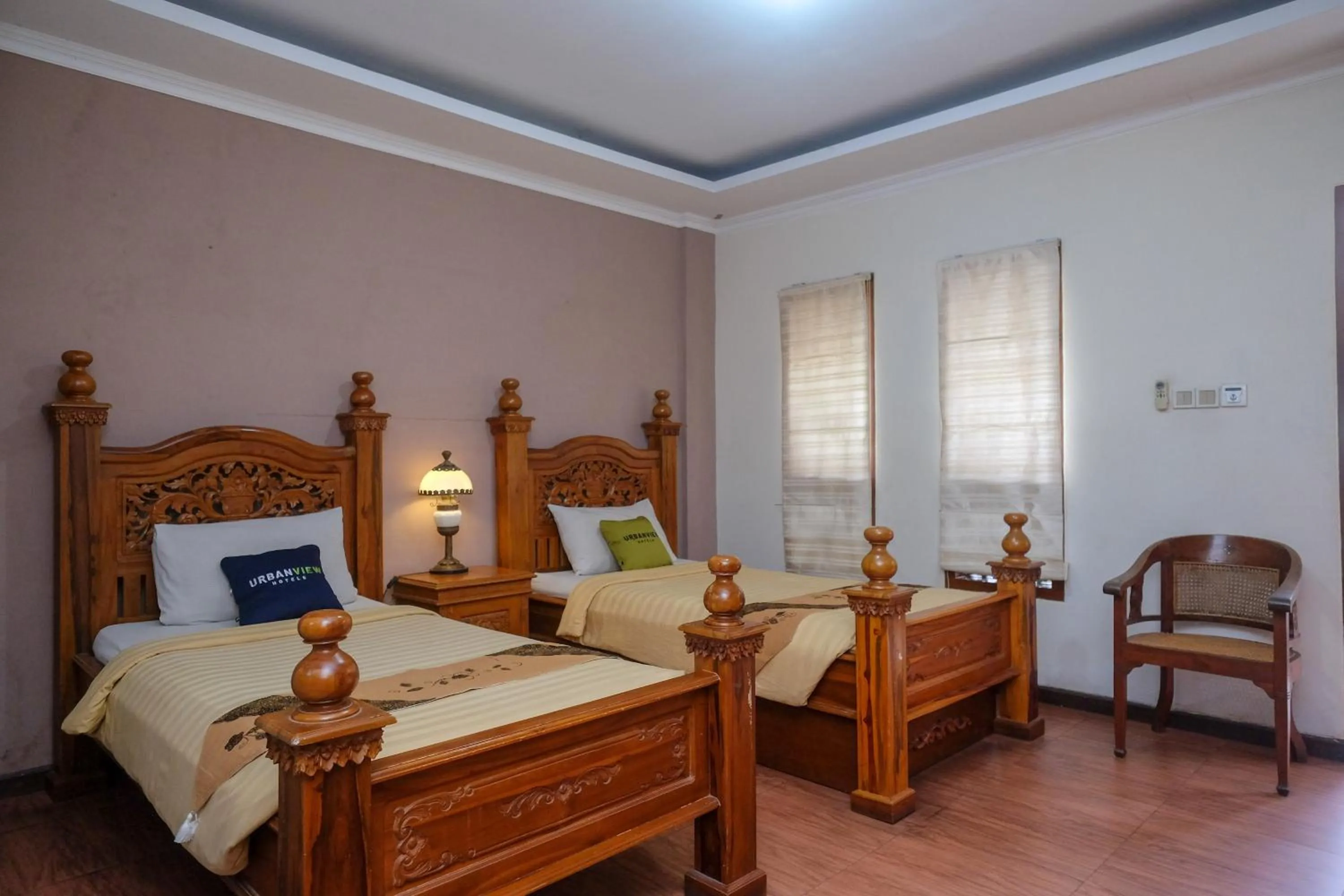 Bedroom, Bed in Urbanview Omah Eka Santi by RedDoorz