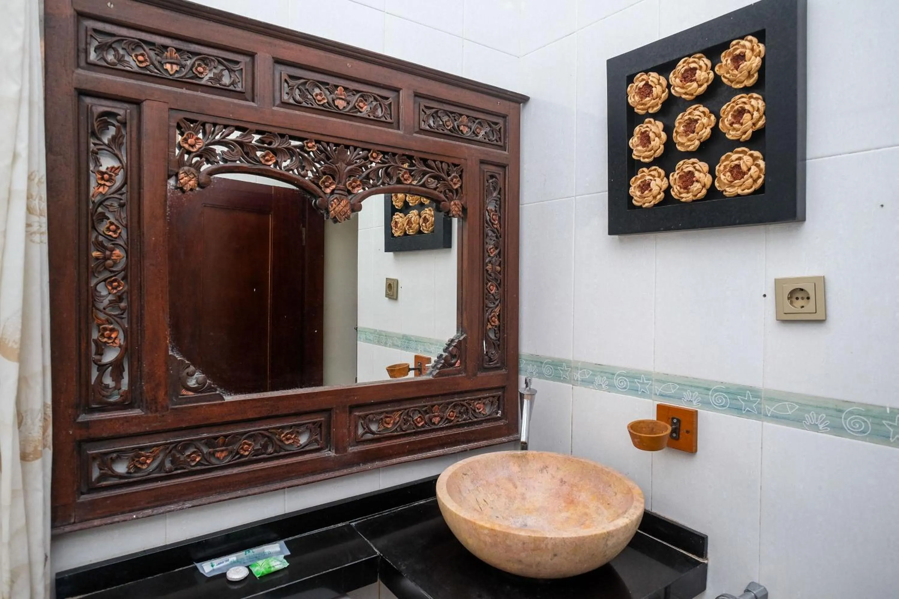 Bathroom in Urbanview Omah Eka Santi by RedDoorz