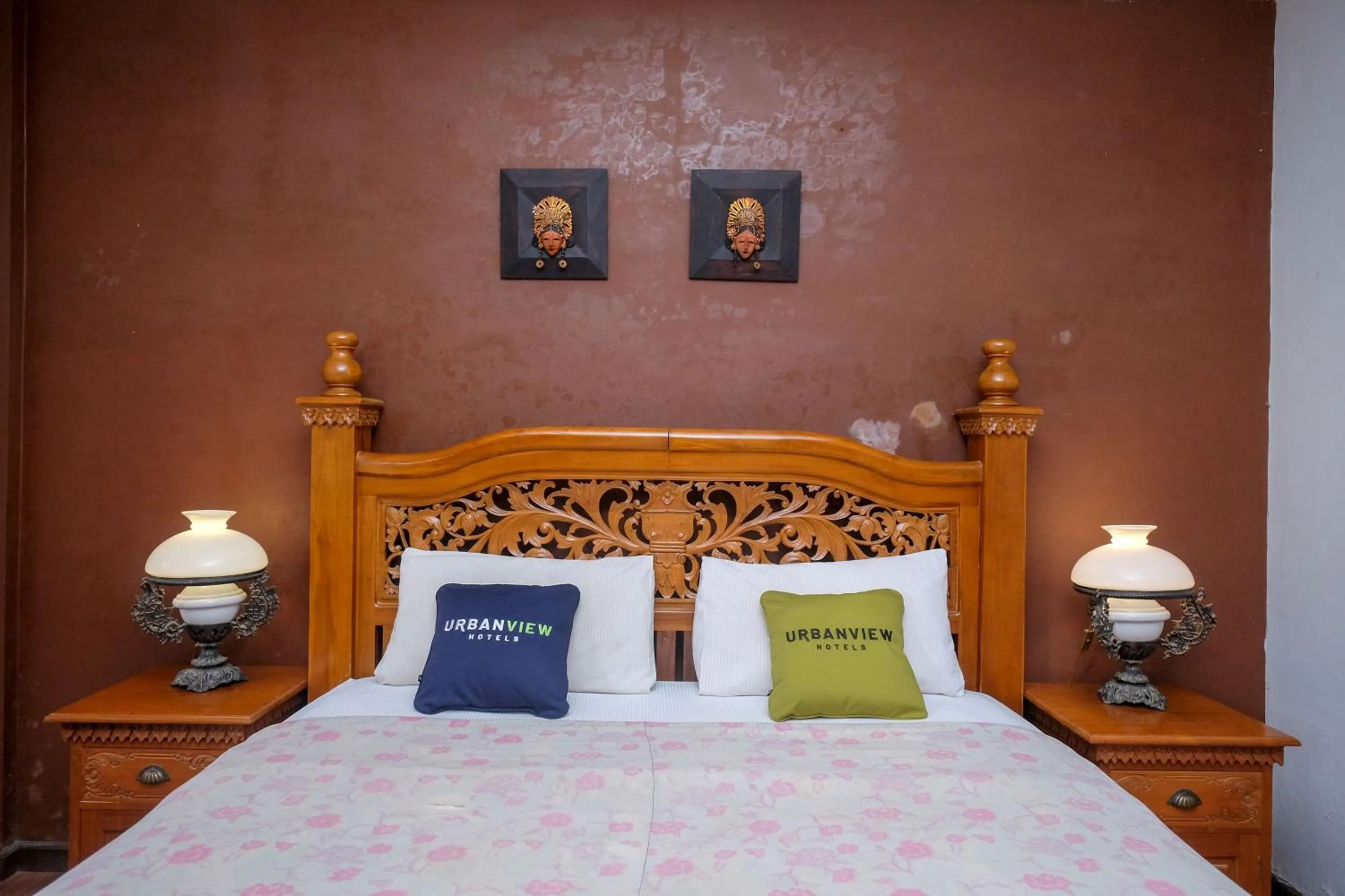 Bedroom, Bed in Urbanview Omah Eka Santi by RedDoorz