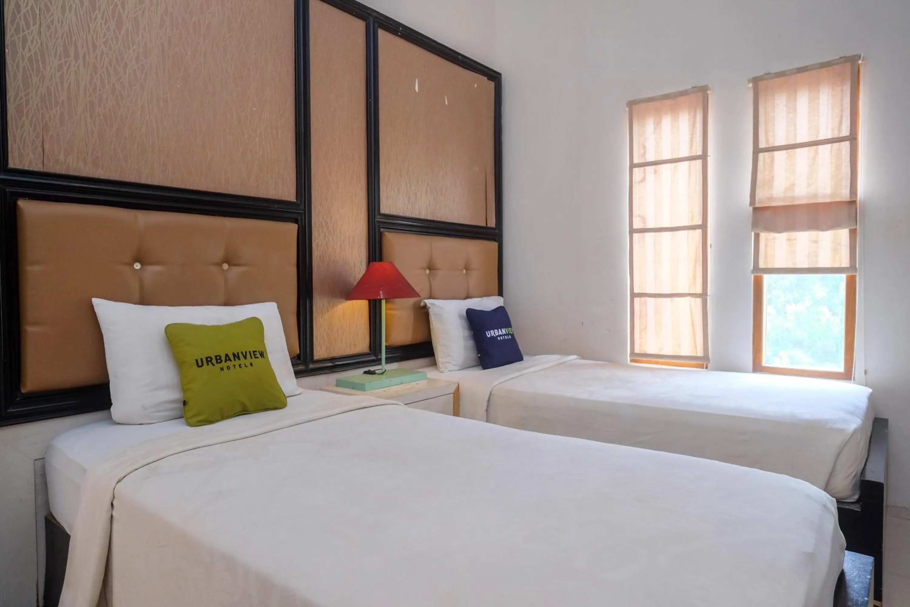 Bedroom, Bed in Urbanview Omah Eka Santi by RedDoorz