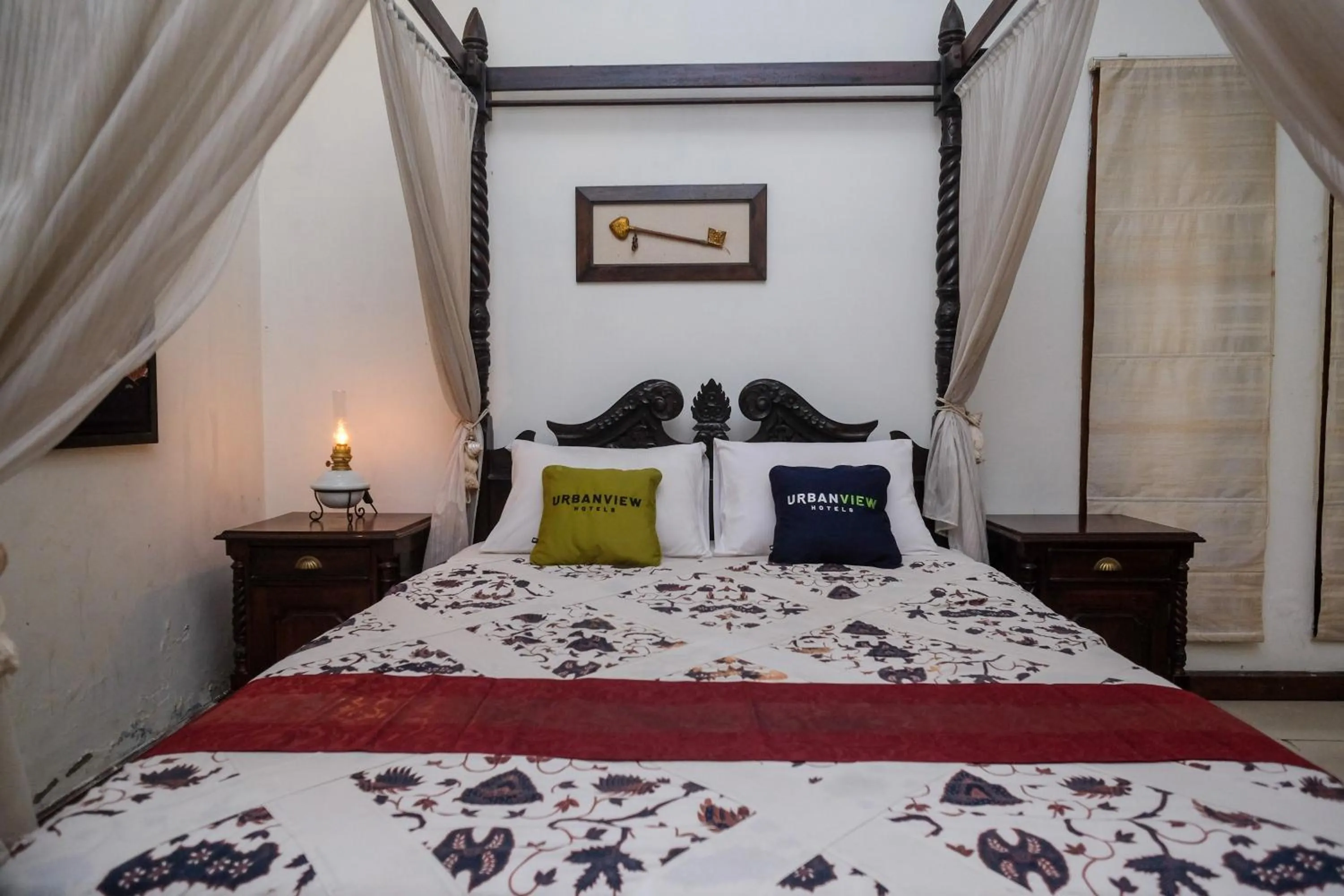 Bedroom, Bed in Urbanview Omah Eka Santi by RedDoorz