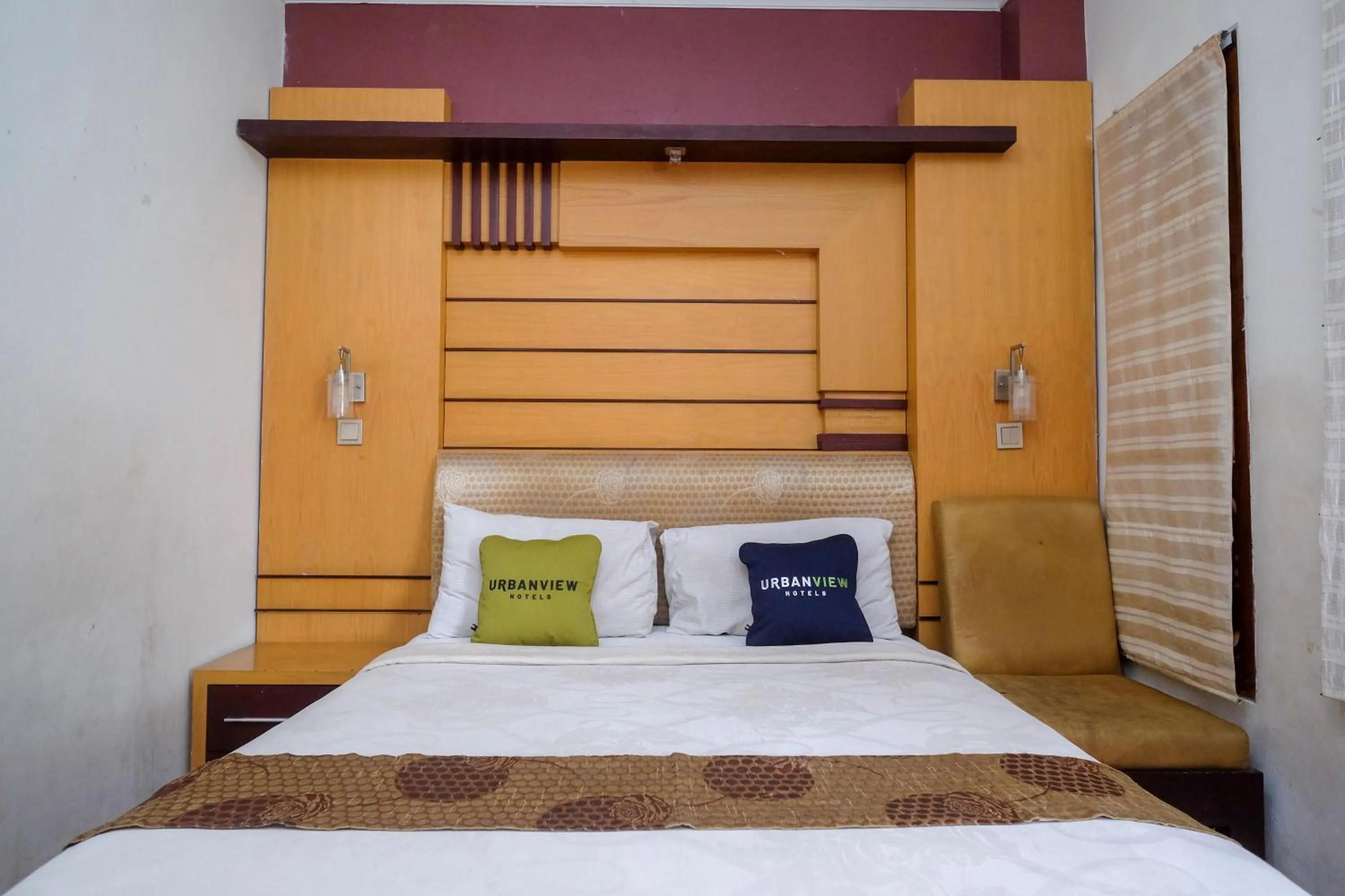 Bedroom, Bed in Urbanview Omah Eka Santi by RedDoorz