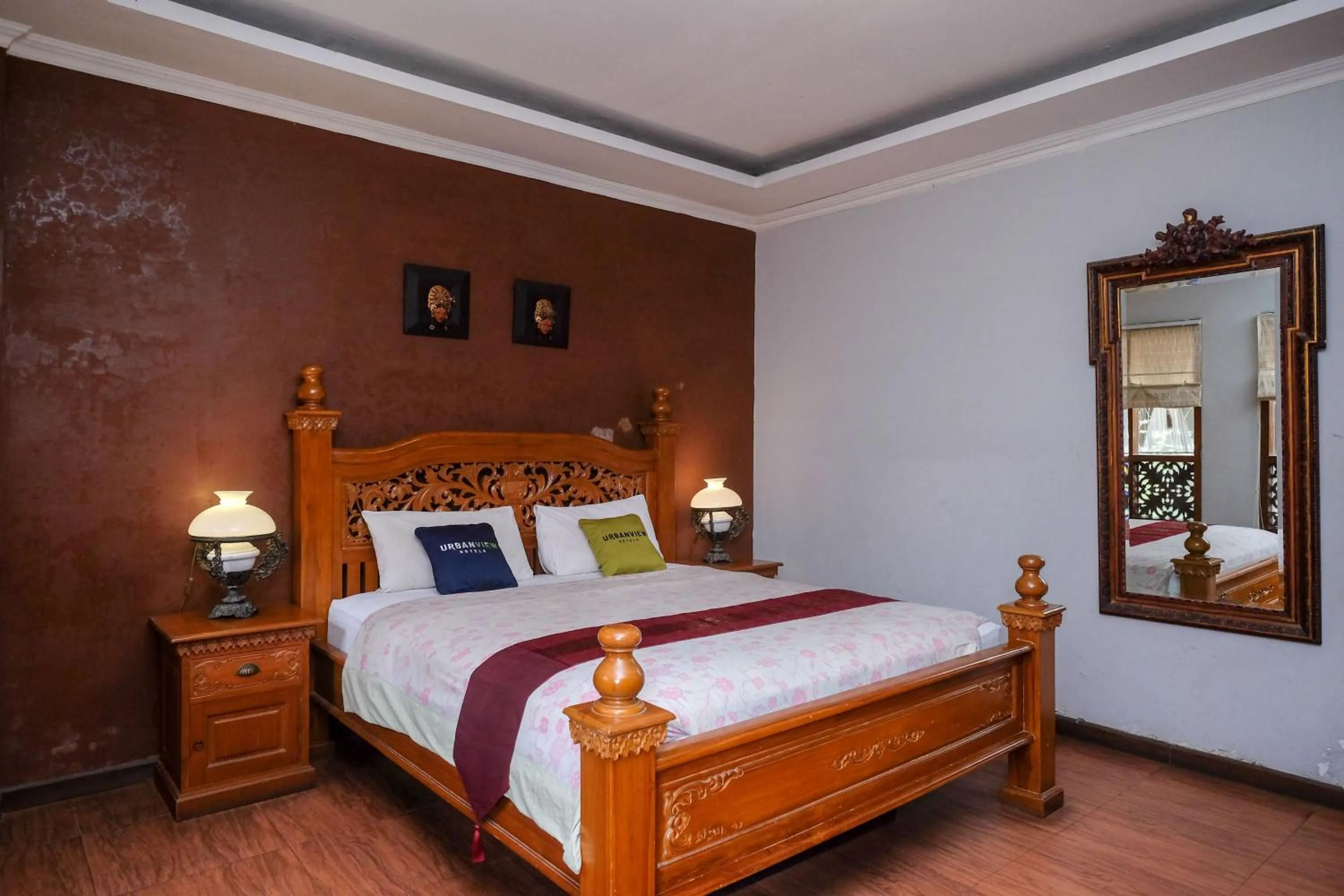 Bedroom, Bed in Urbanview Omah Eka Santi by RedDoorz