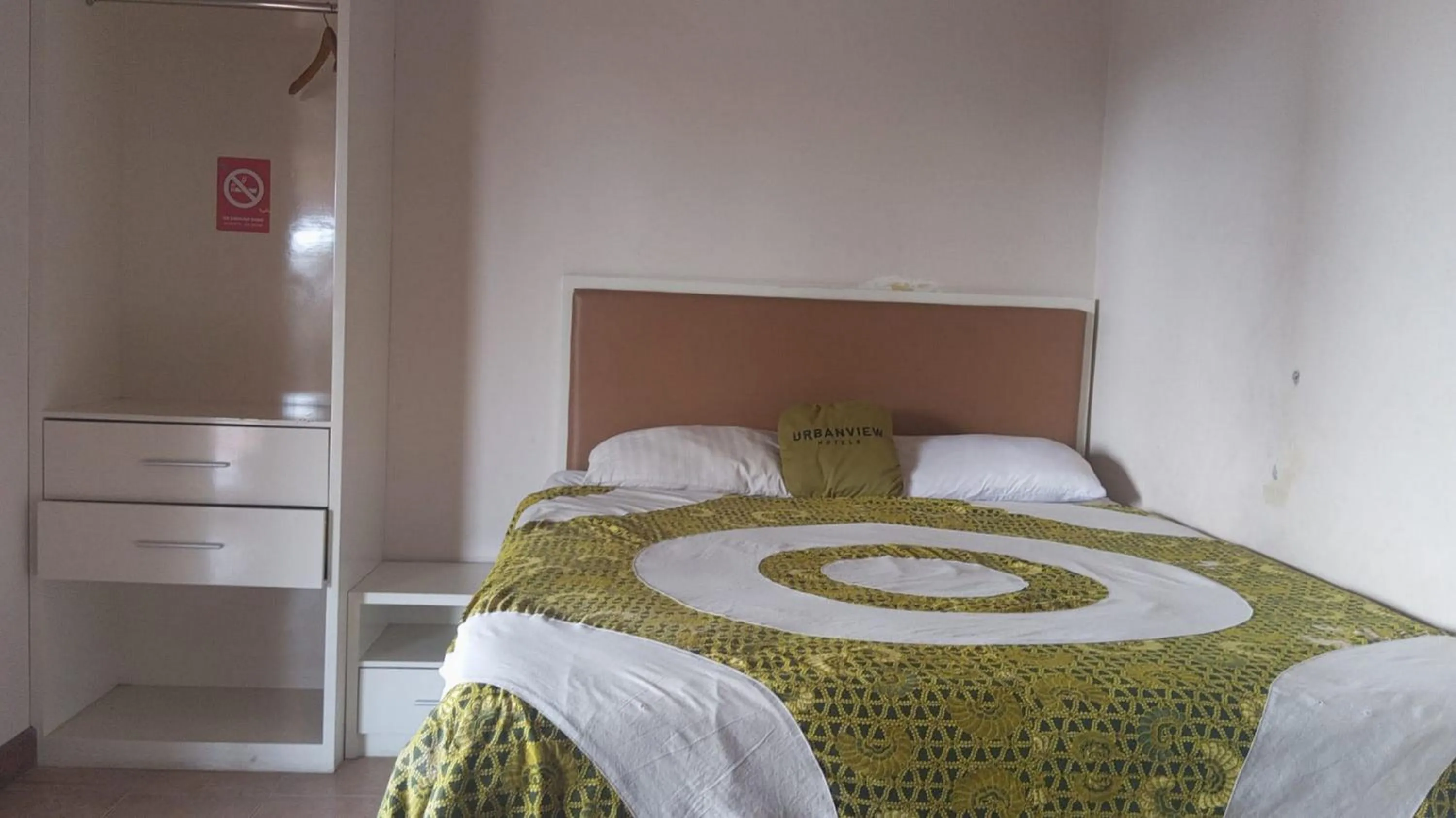 Bedroom, Bed in Urbanview Omah Eka Santi by RedDoorz