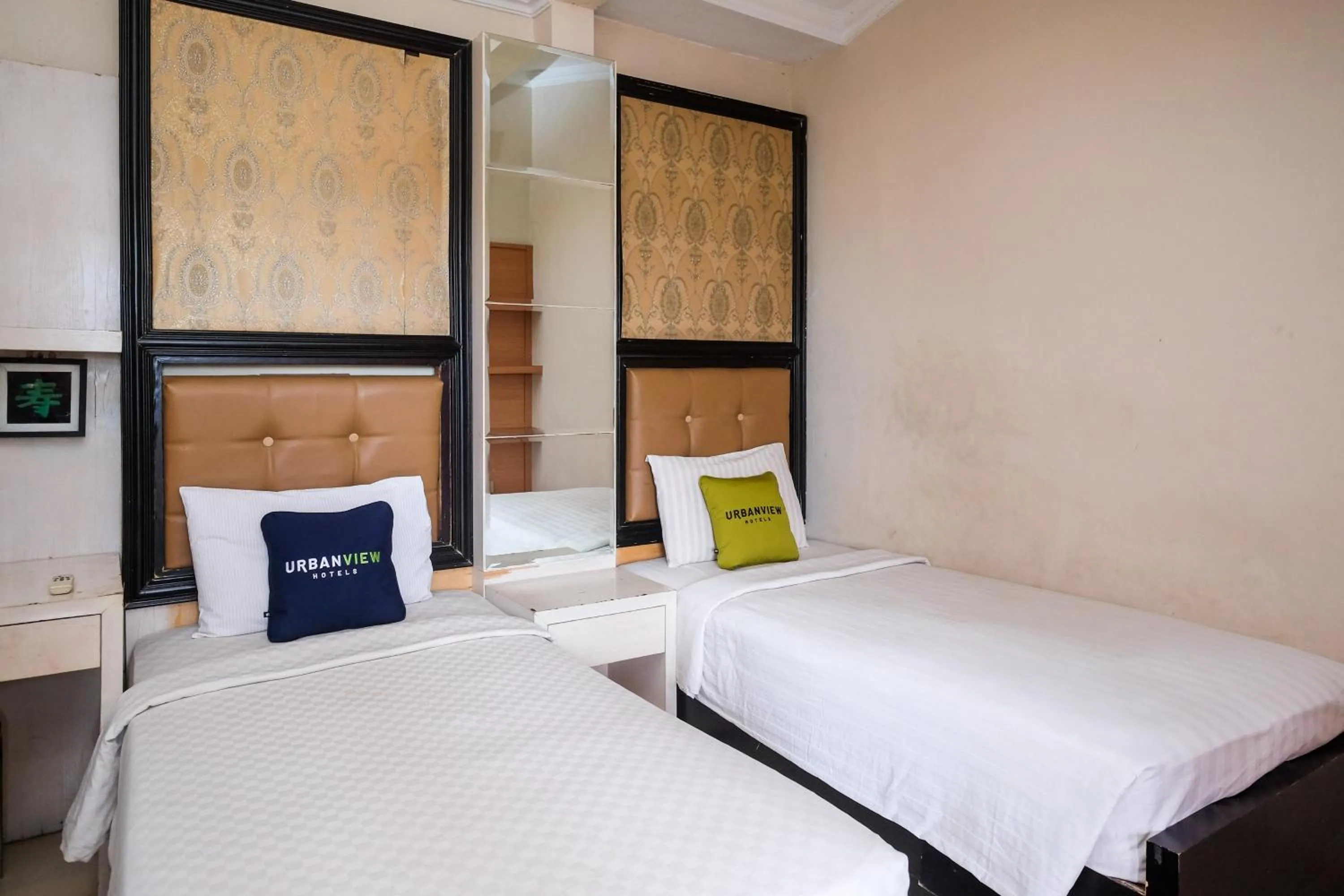 Bedroom, Bed in Urbanview Omah Eka Santi by RedDoorz