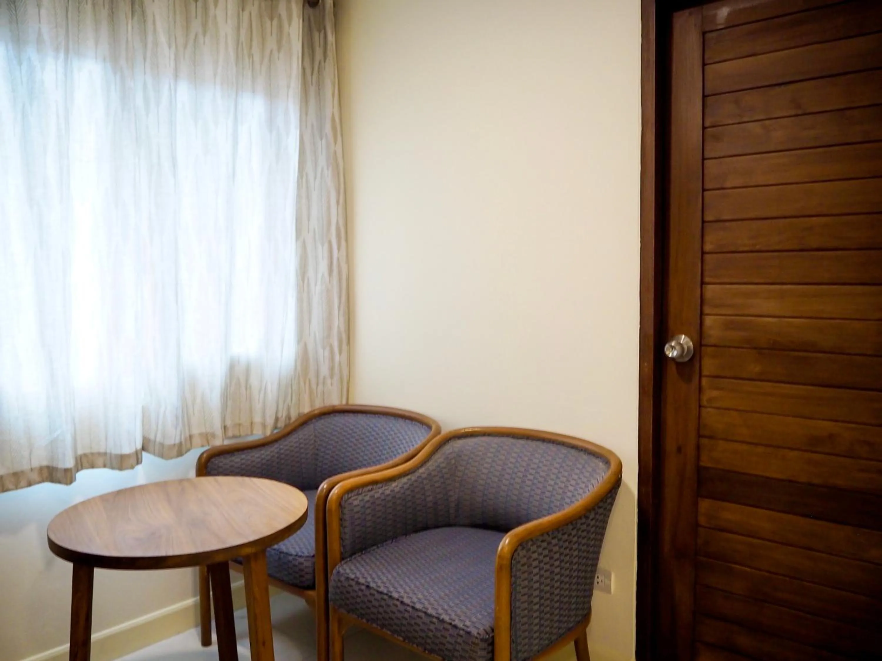 Seating area in Baan Dan Ta Wan Nuea