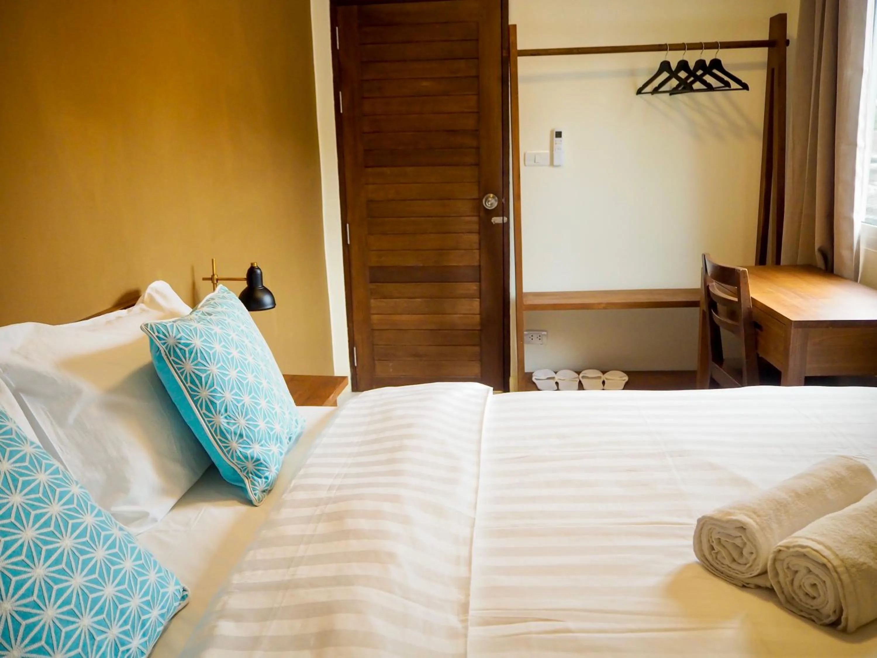 Bed in Baan Dan Ta Wan Nuea