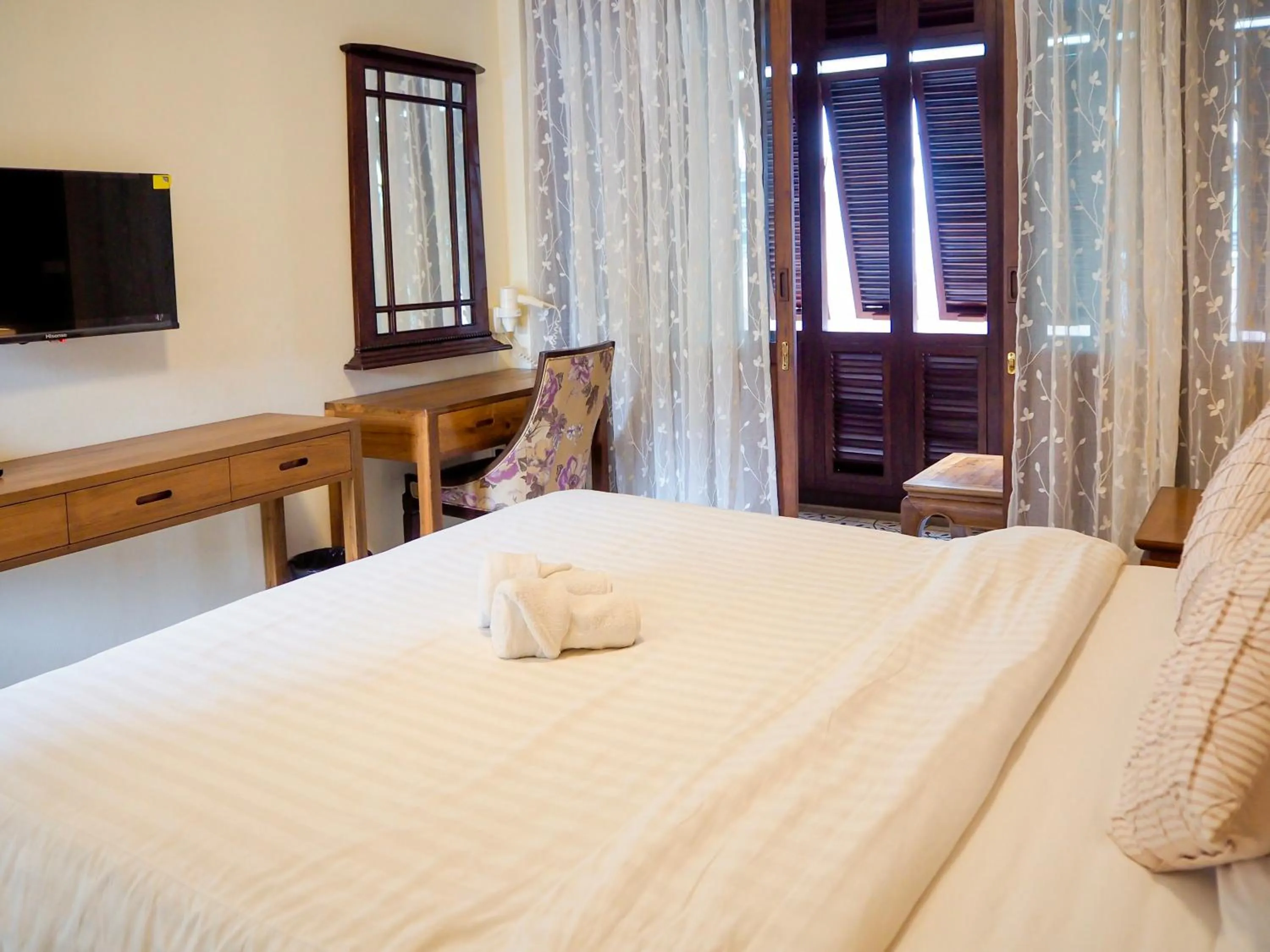 Bed in Baan Dan Ta Wan Nuea