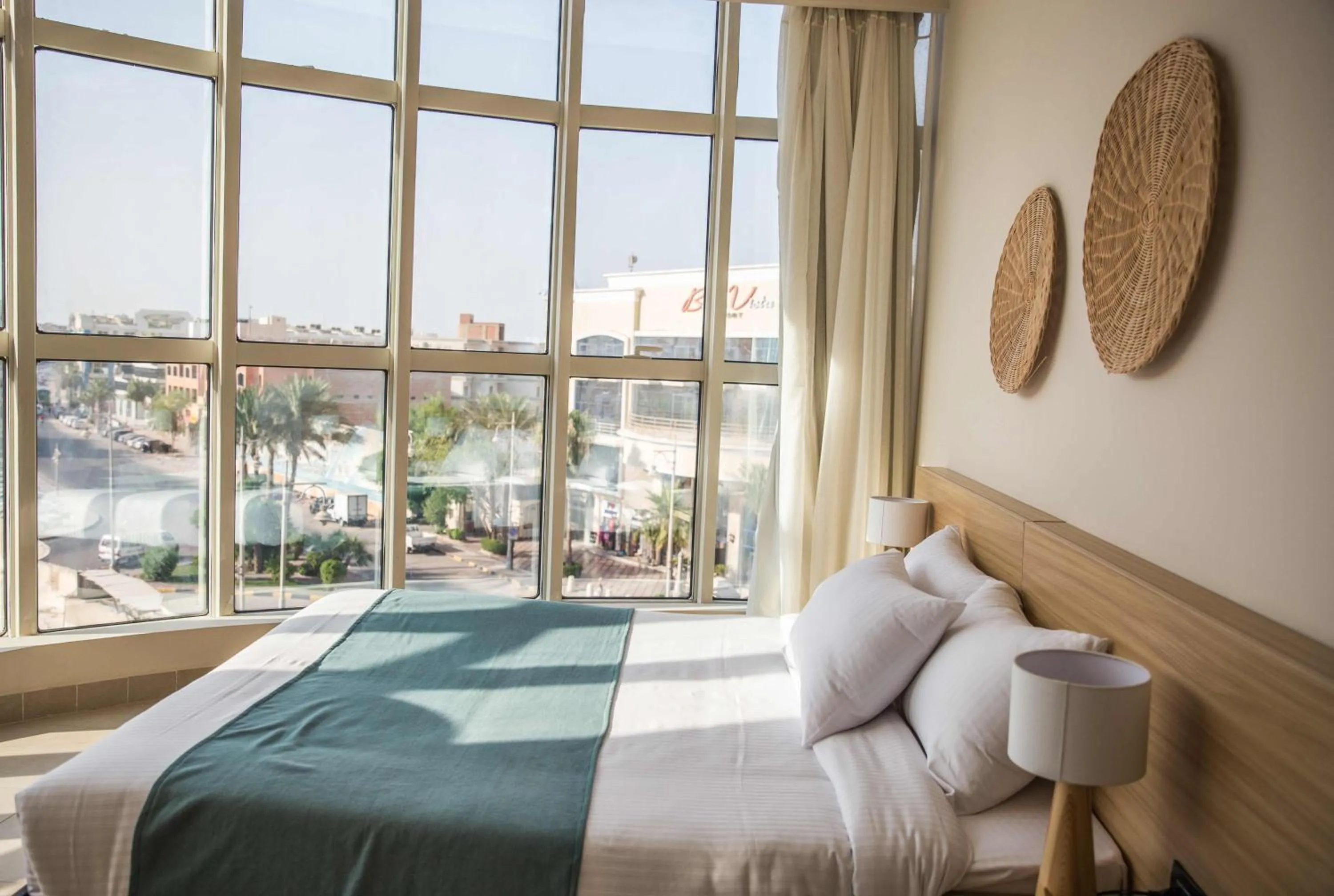 Photo of the whole room, Bed in Redcon Suites