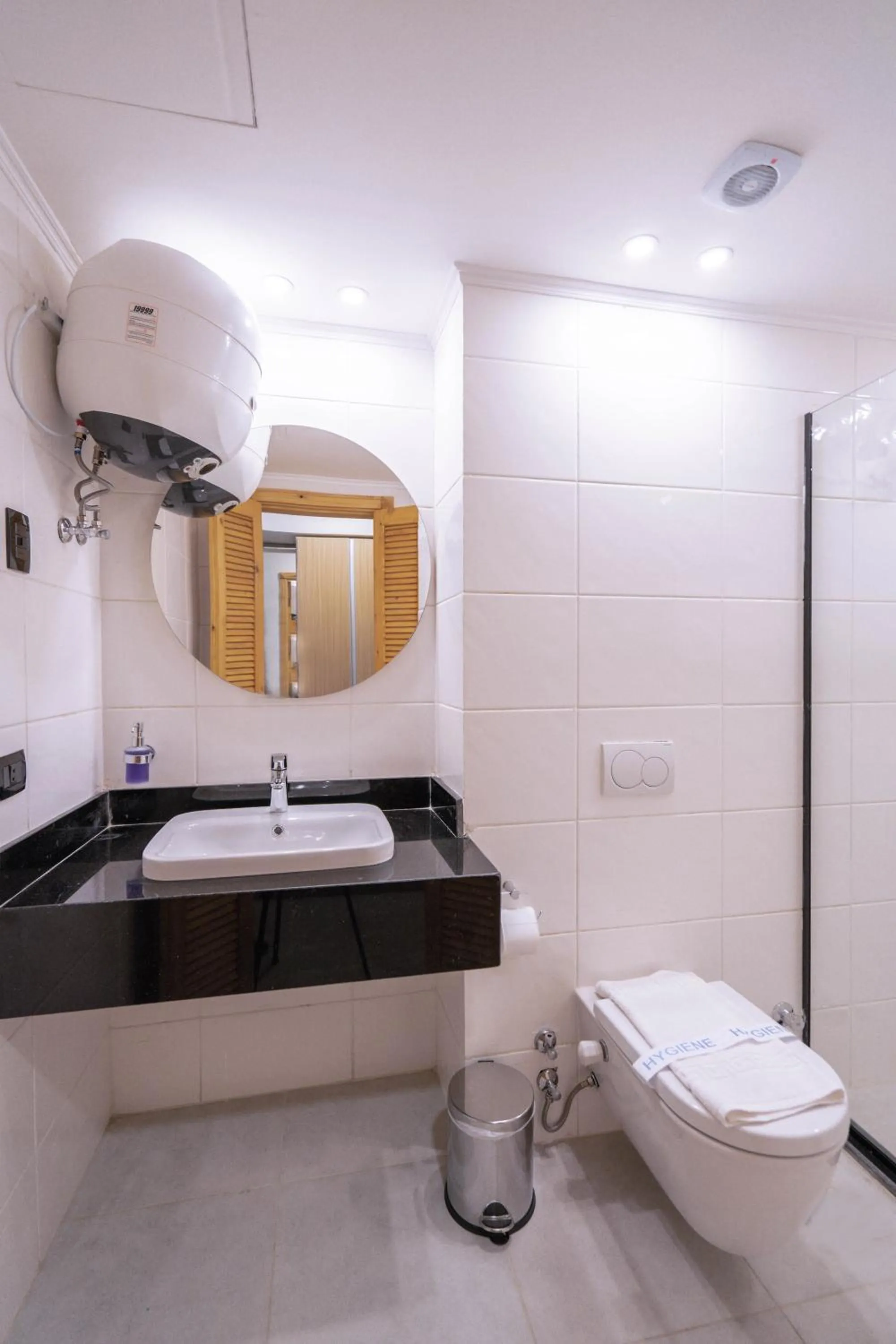 Toilet in Redcon Suites