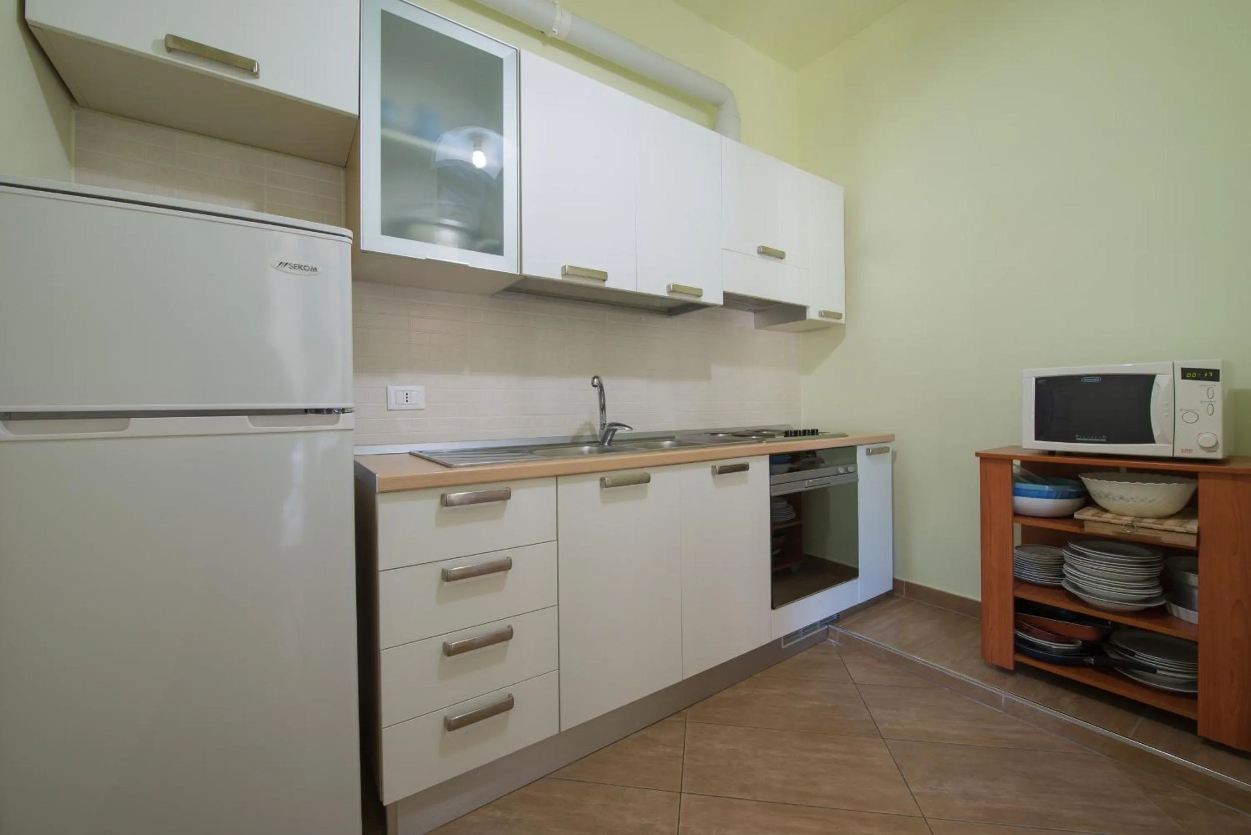 Kitchen or kitchenette in Residence Palazzo Gasparroni