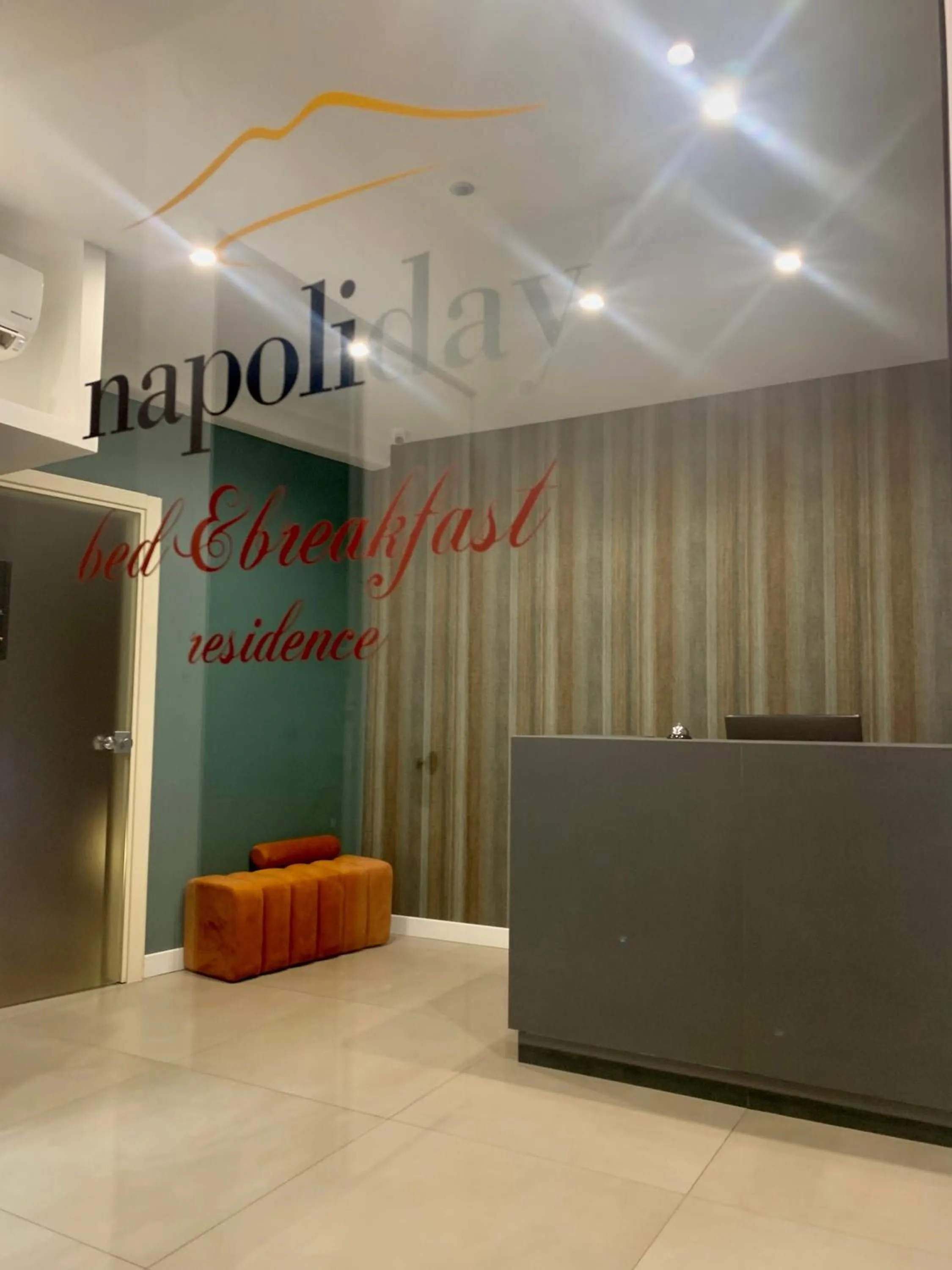 Property logo or sign in Napoliday