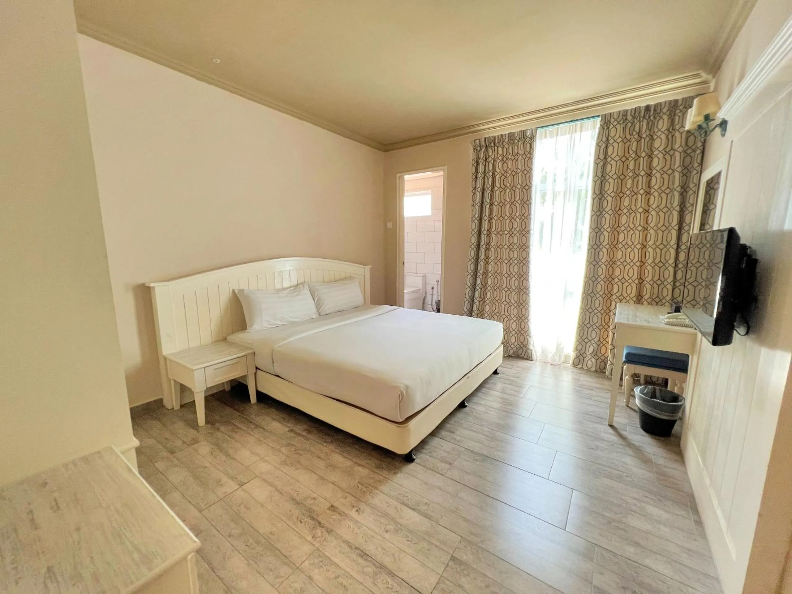 Bed in Tasik Villa International Resort