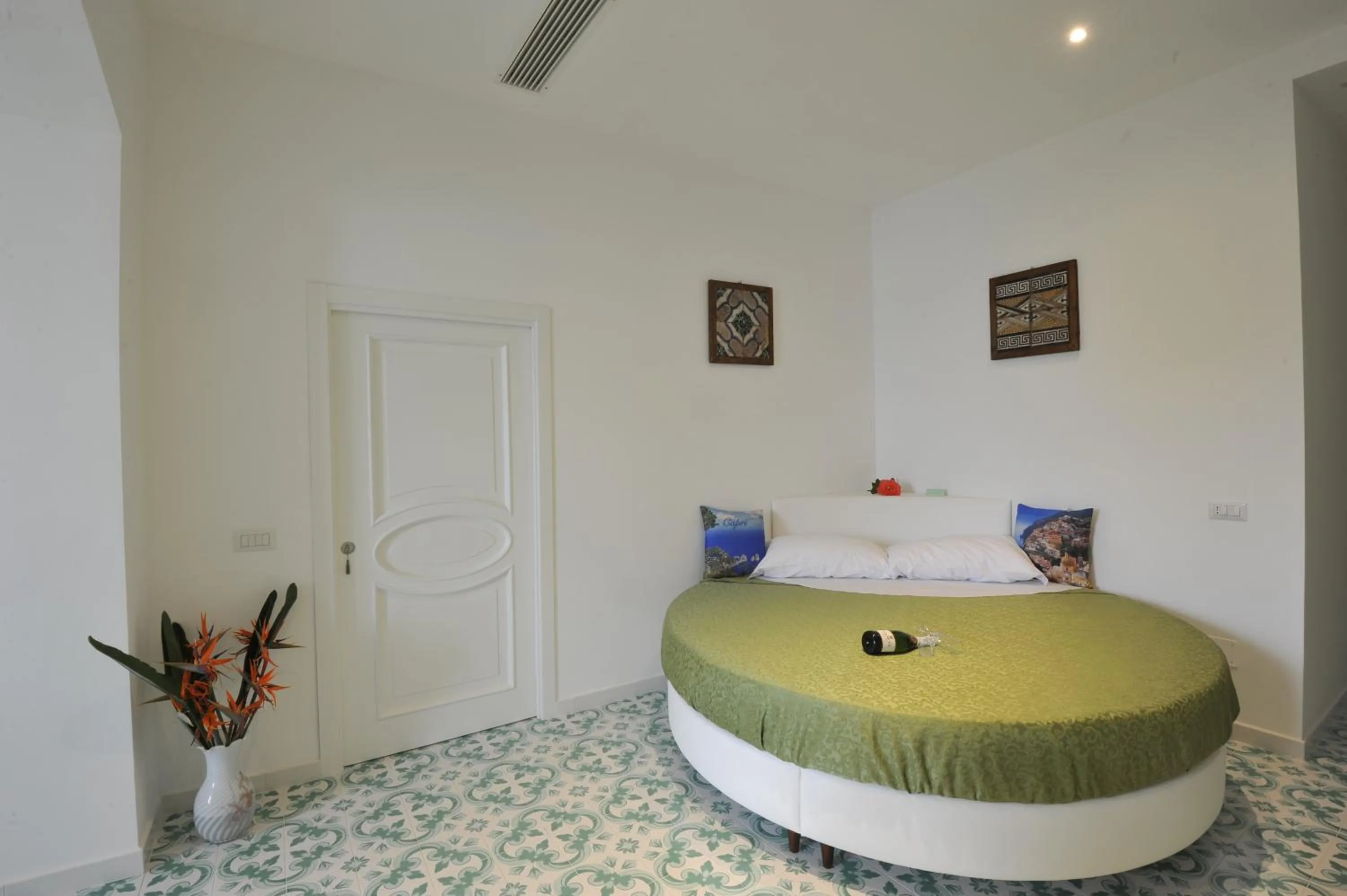 Bed in Surriento Suites