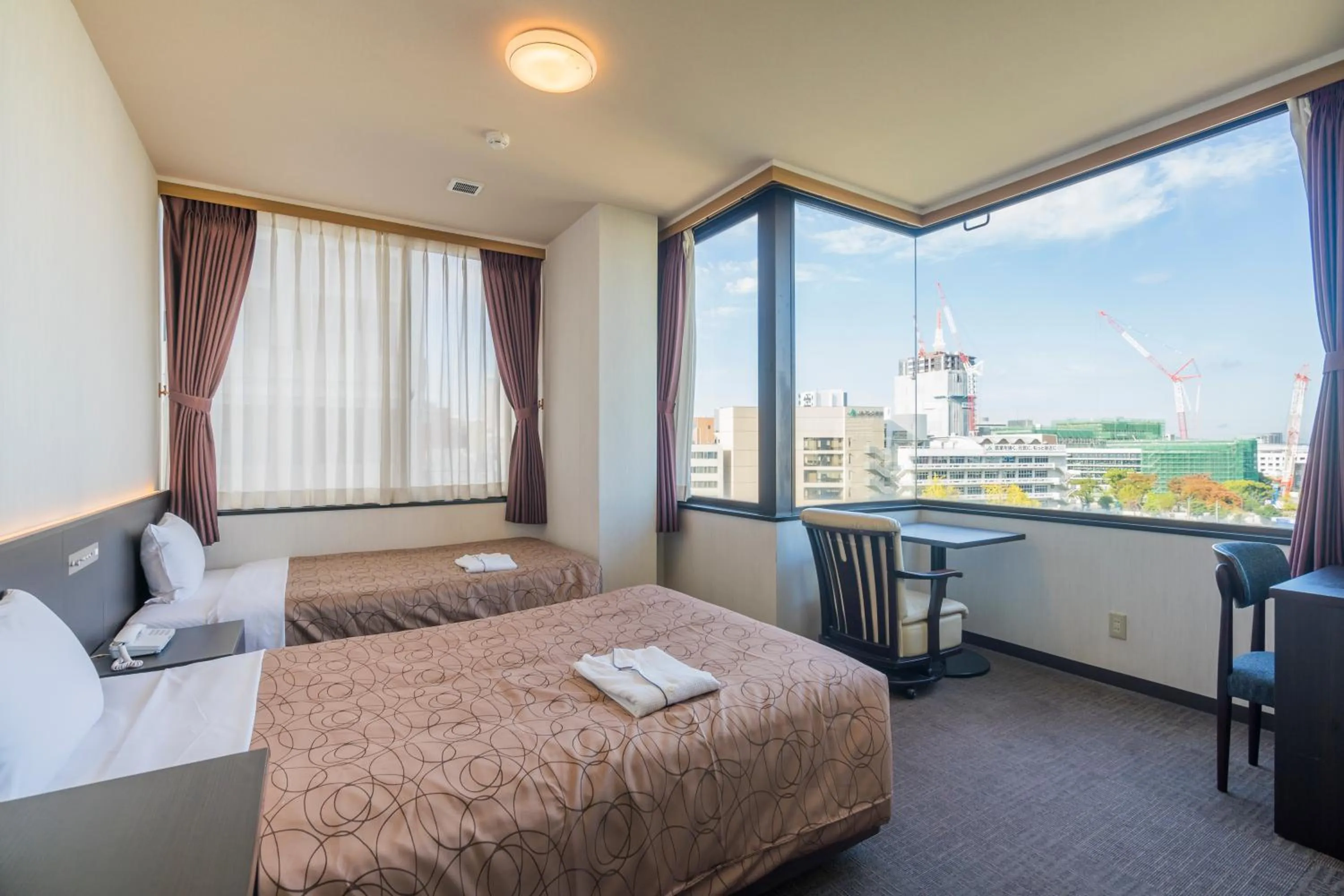 Photo of the whole room, Bed in Hotel Hakata Nakasu Inn