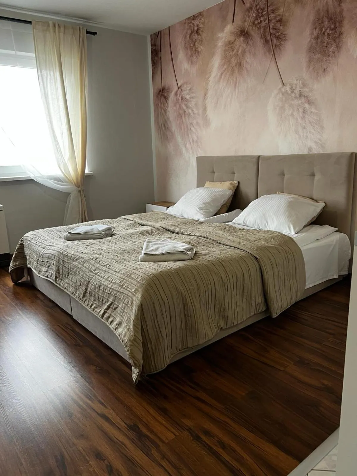 Bed in Delta Apart-House