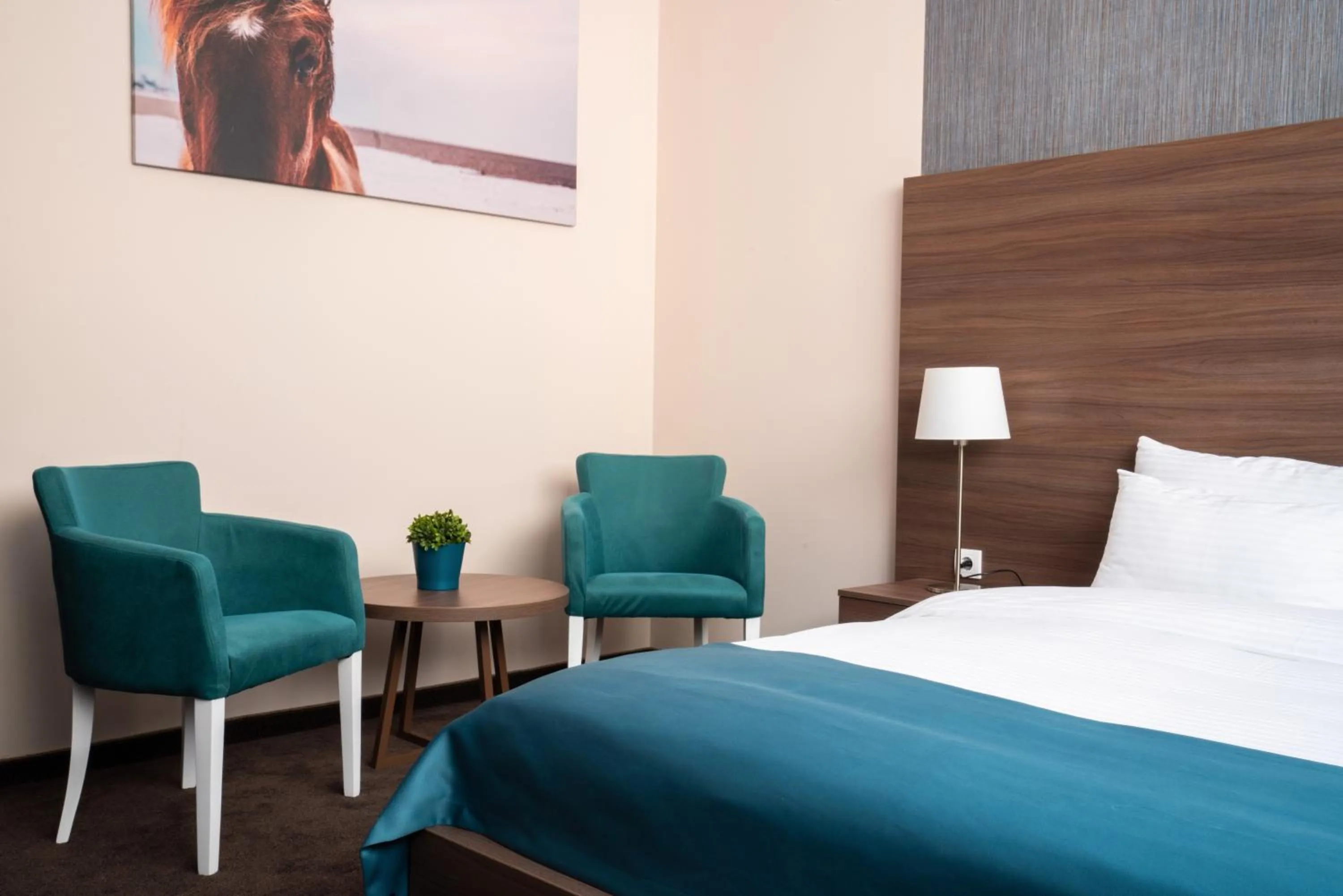 Seating area, Bed in Veneti Suites