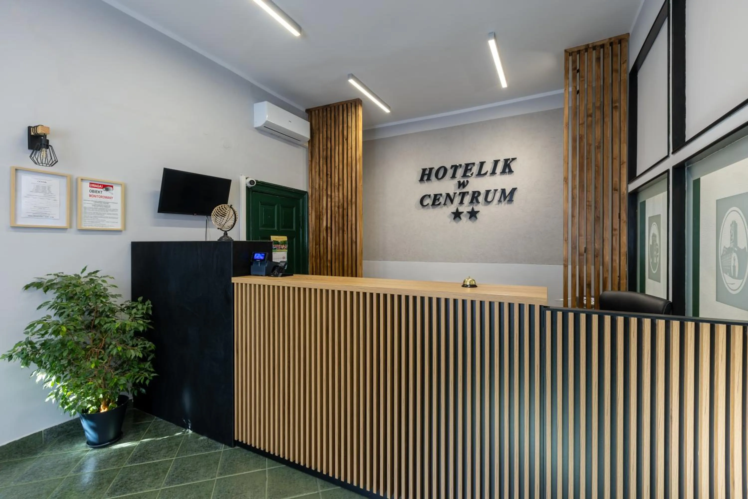 Lobby or reception in Hotelik w Centrum