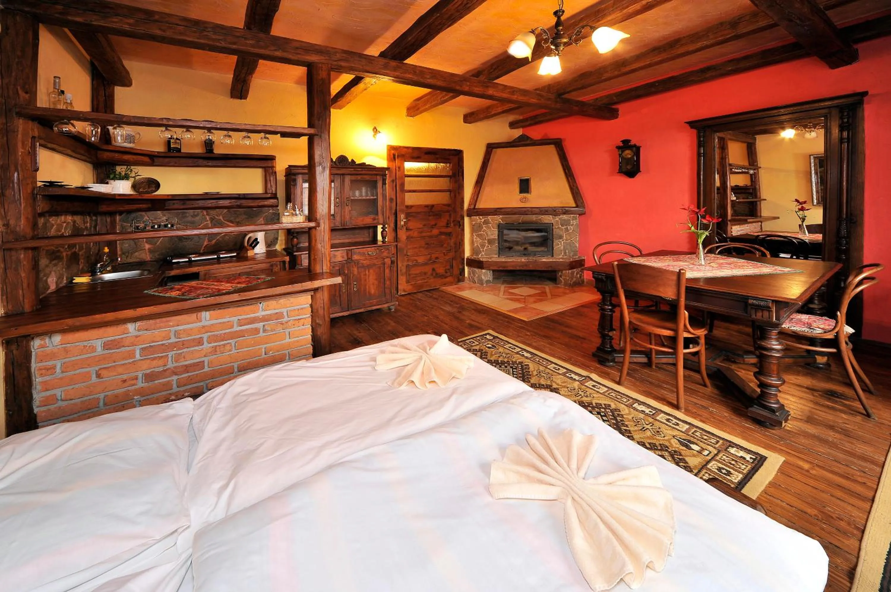 Kitchen or kitchenette, Bed in Apartmány Village