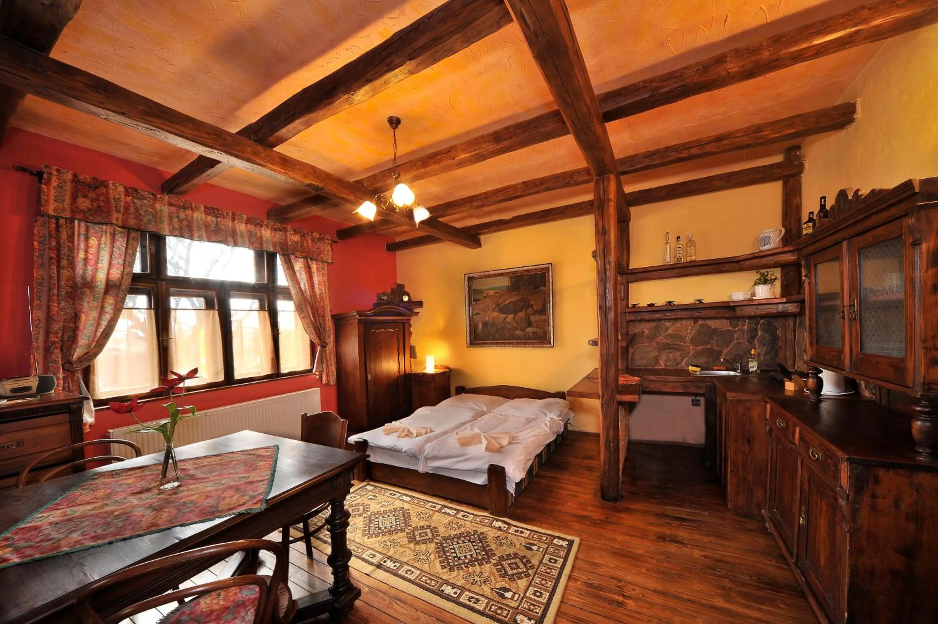 Kitchen or kitchenette, Bed in Apartmány Village