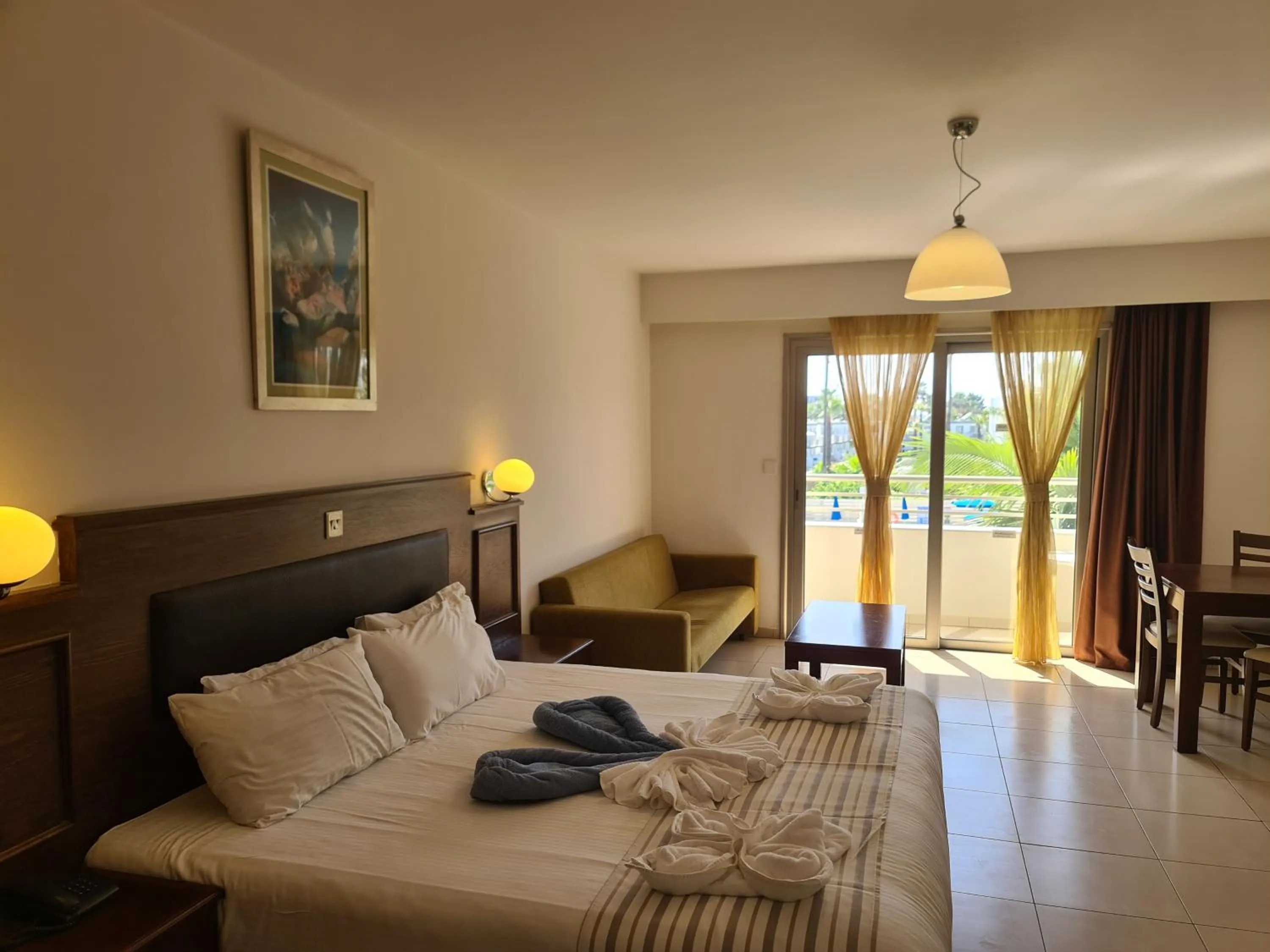 Bed in Euronapa Hotel Apartments