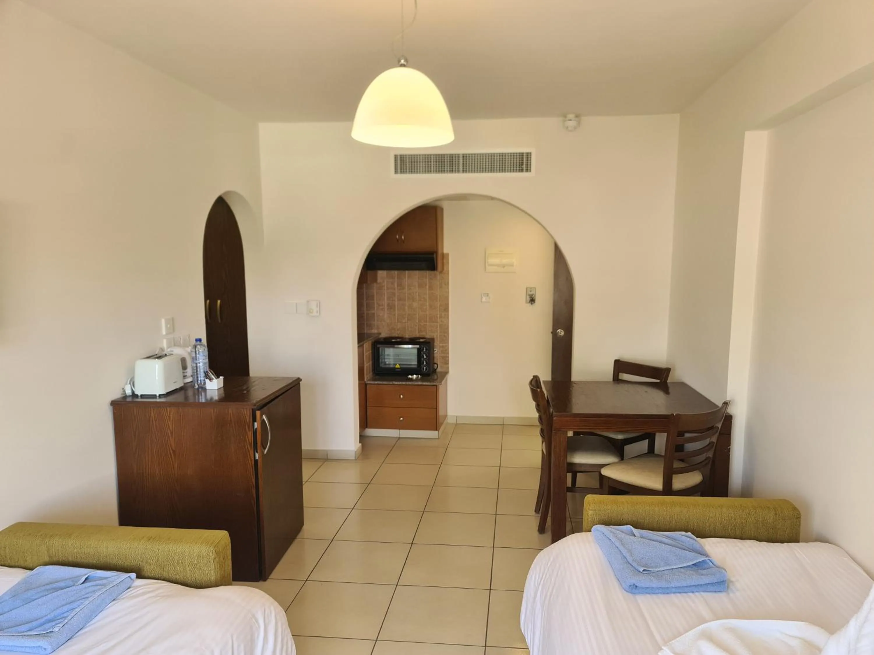 Living room, Bed in Euronapa Hotel Apartments