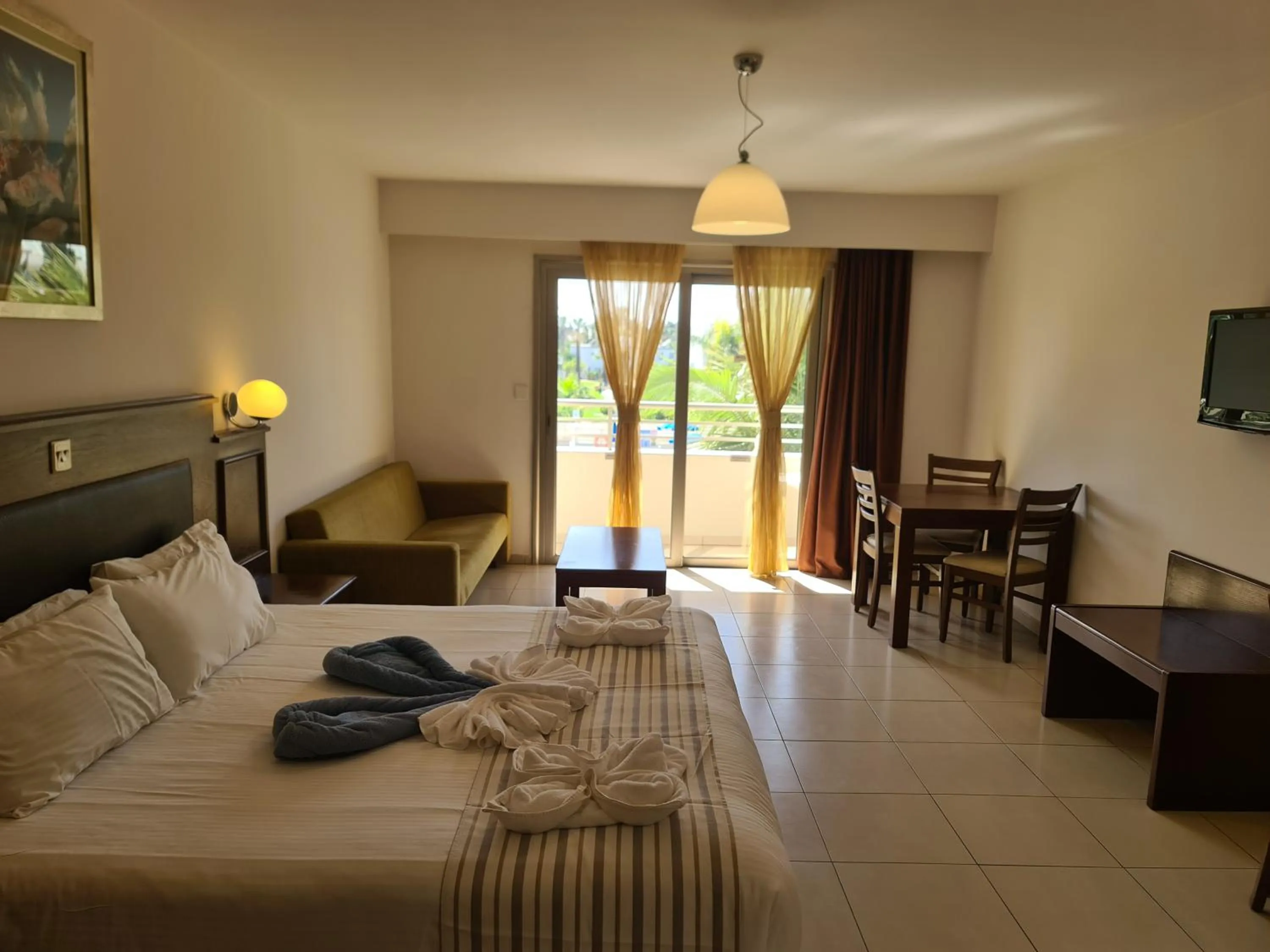 Bed in Euronapa Hotel Apartments