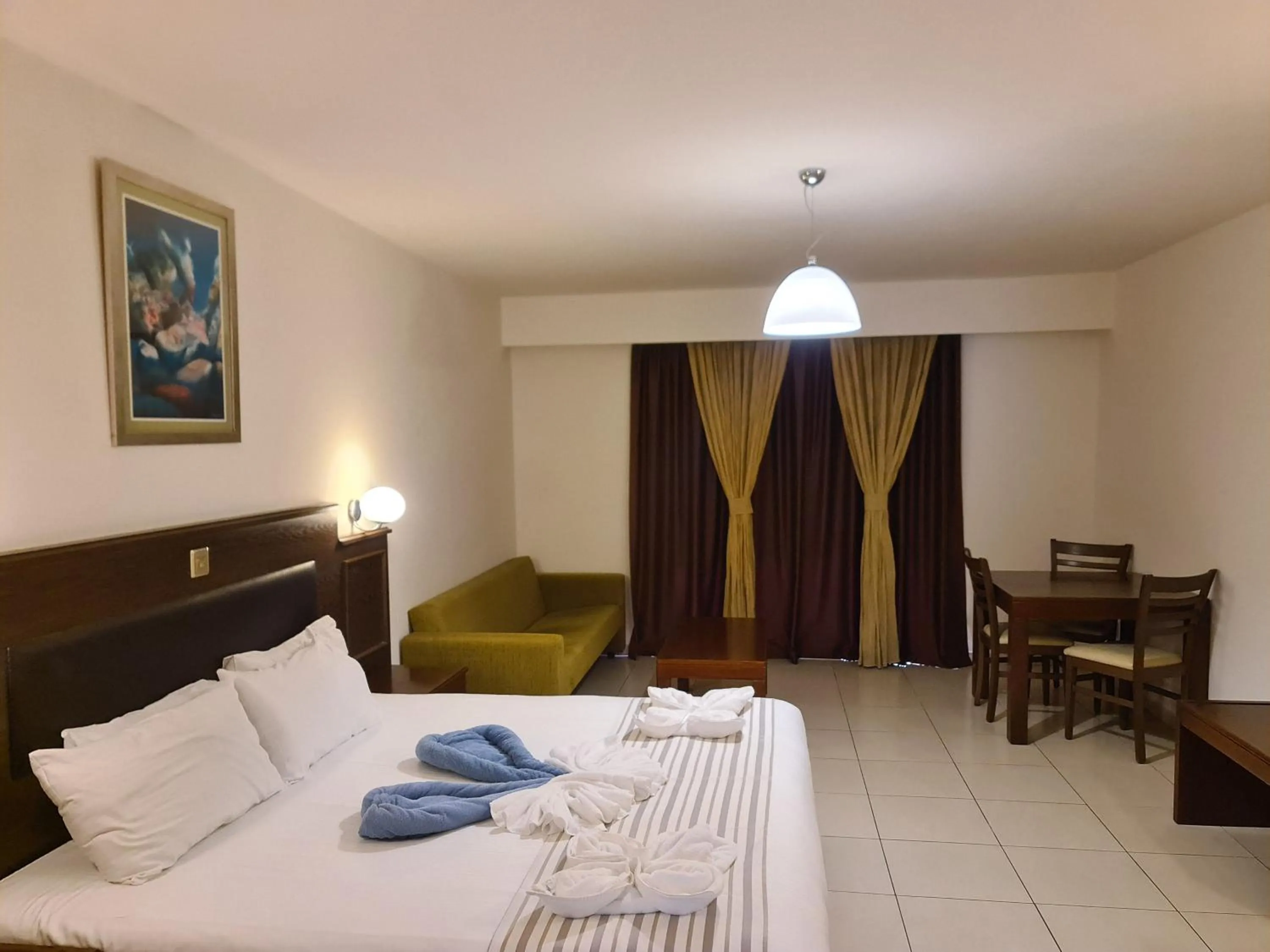 Bed in Euronapa Hotel Apartments