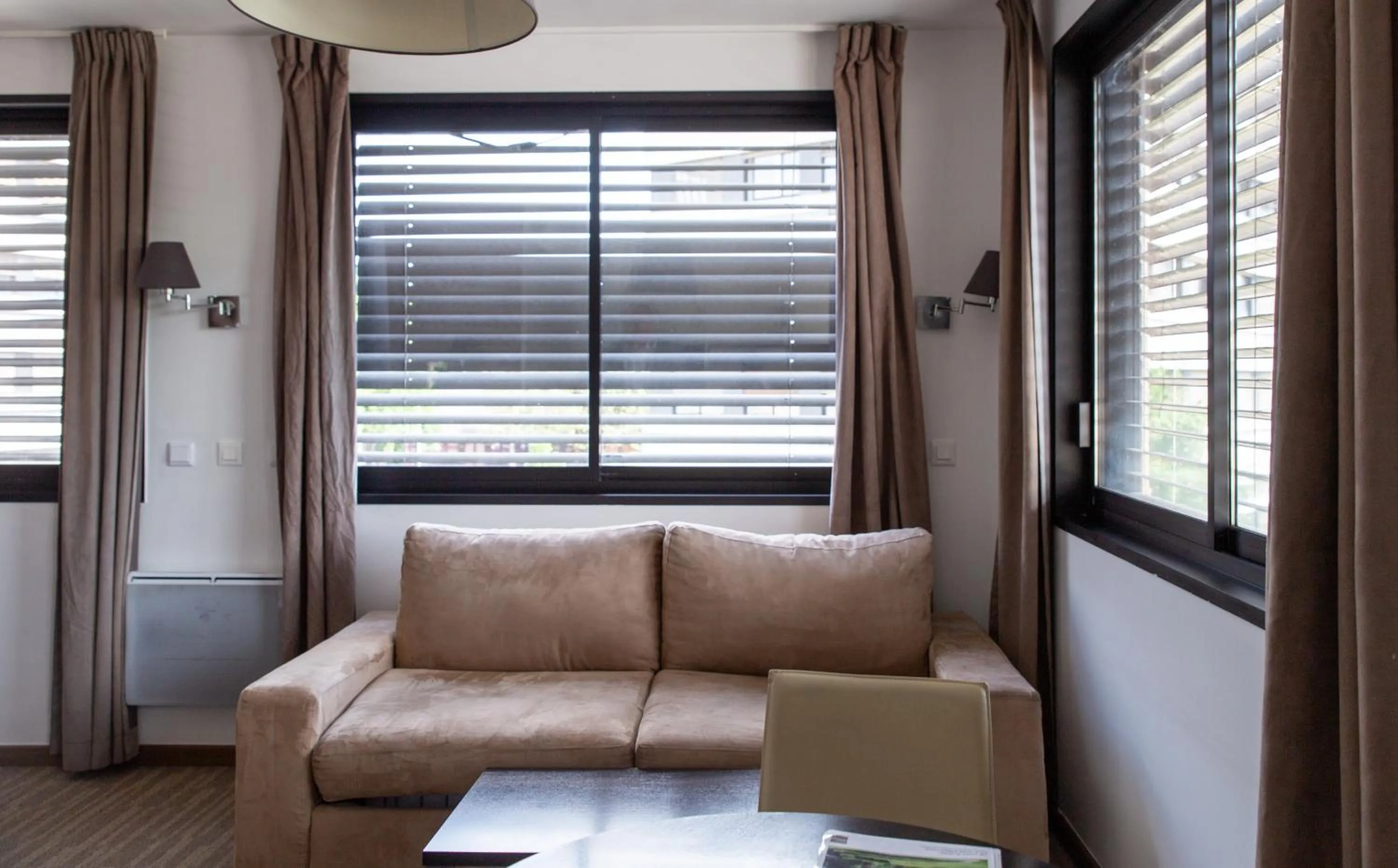 Living room in Zenitude Swiss Apparthotels