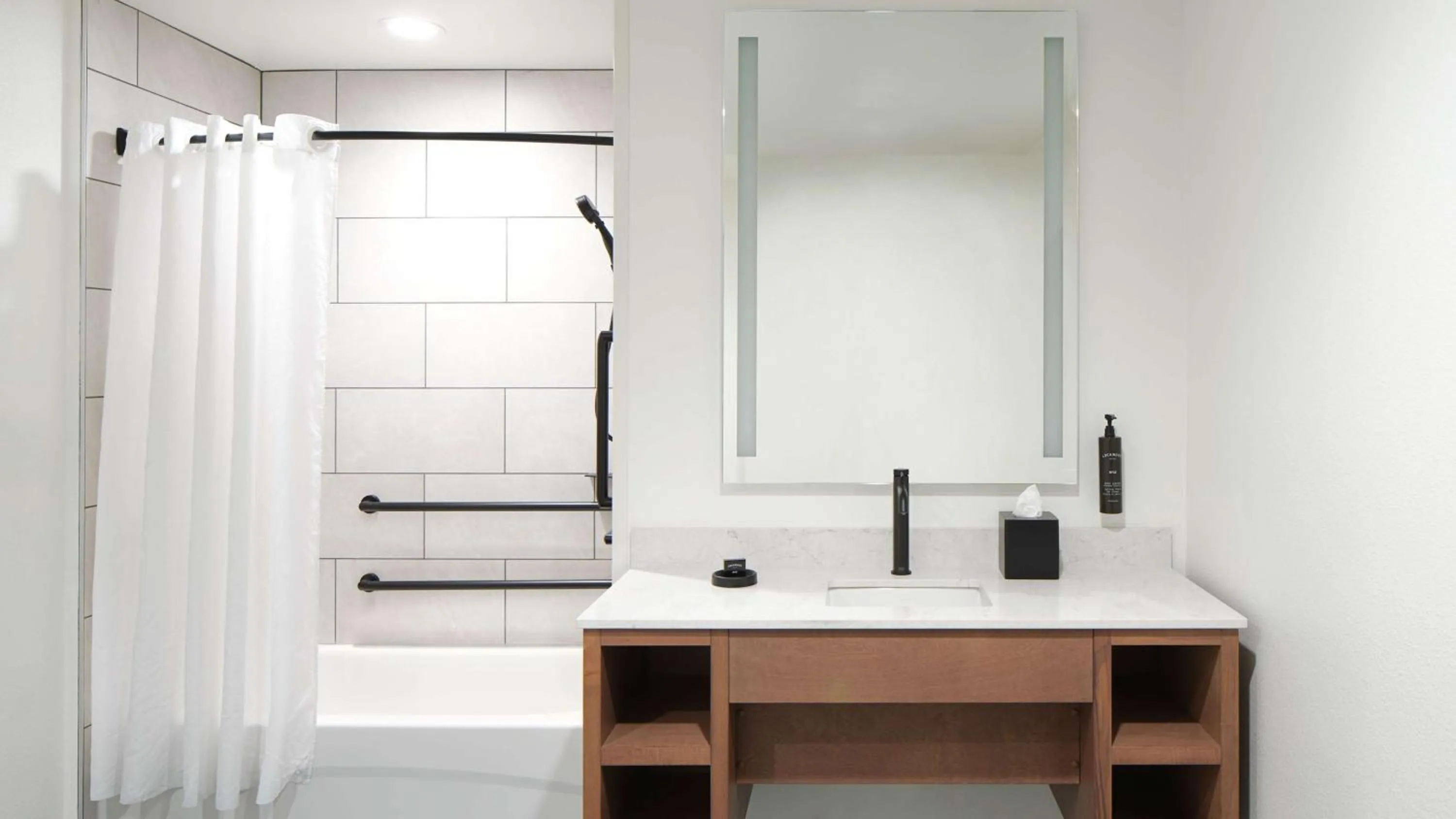 Bathroom in River's Edge Hotel Portland, Tapestry Collection by Hilton