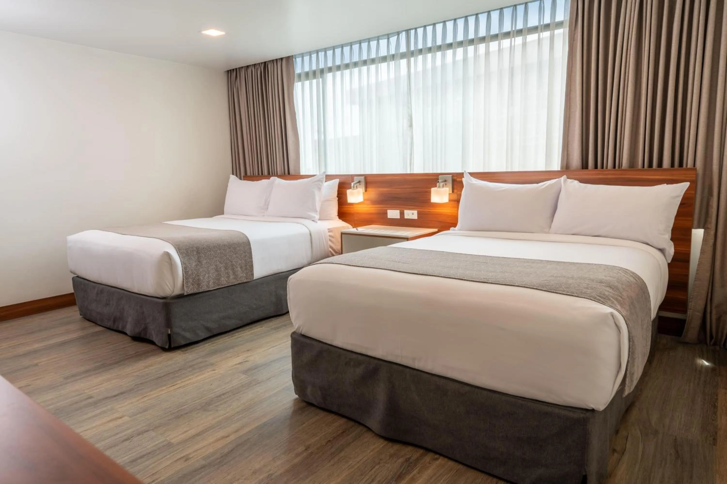 Photo of the whole room, Bed in Wyndham Garden Quito