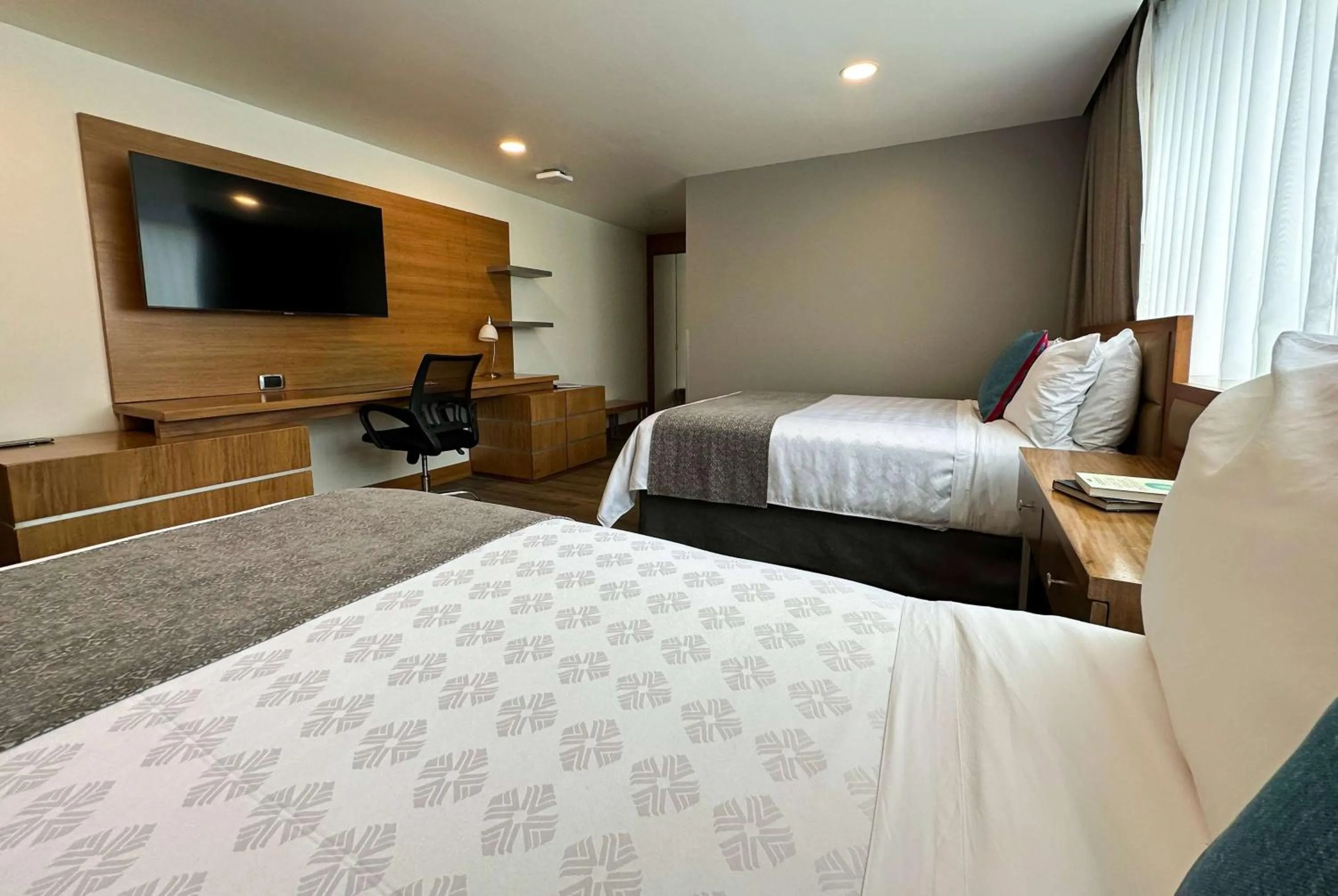 Photo of the whole room, Bed in Wyndham Garden Quito