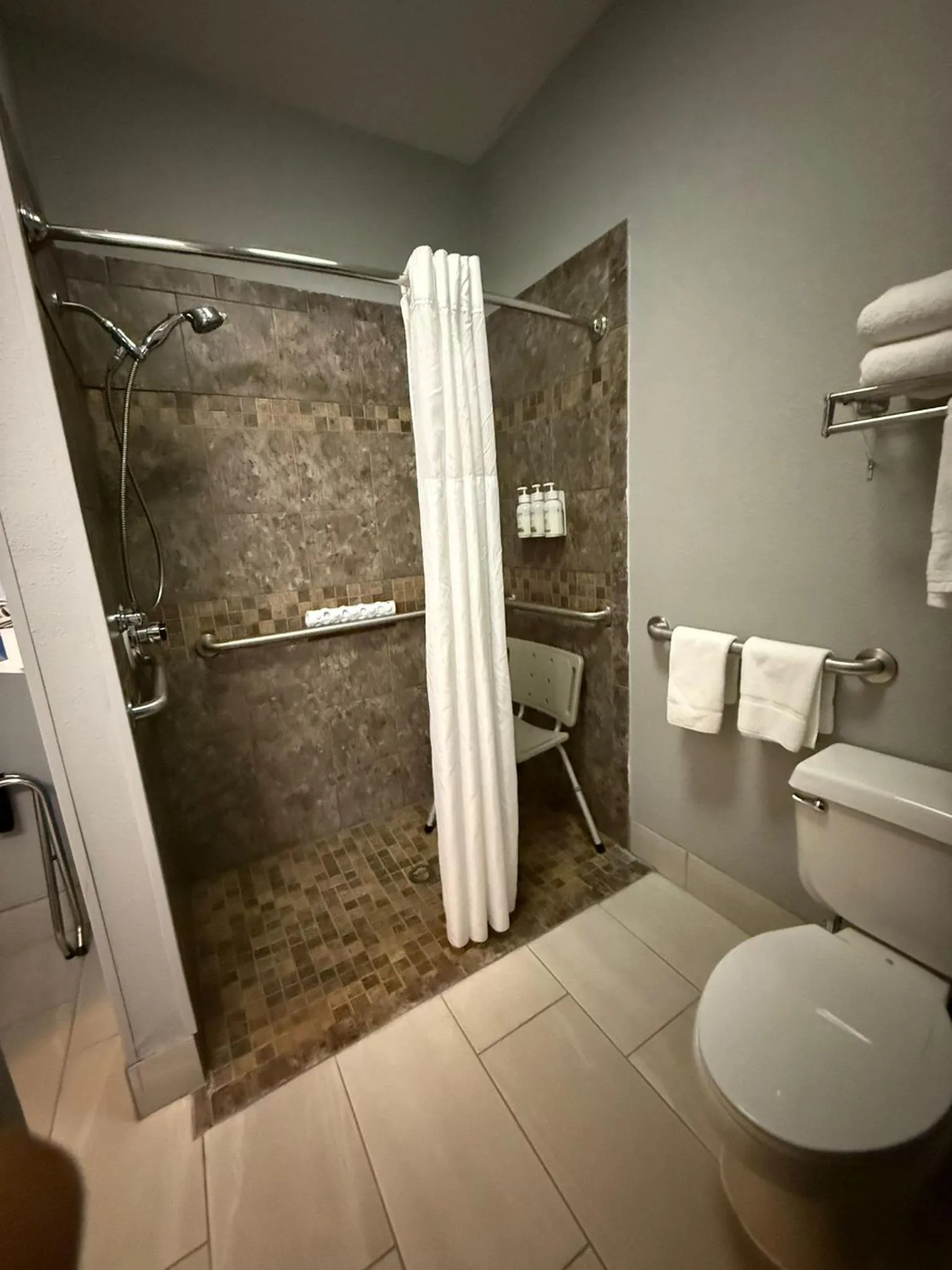 Shower in AmericInn by Wyndham Minot