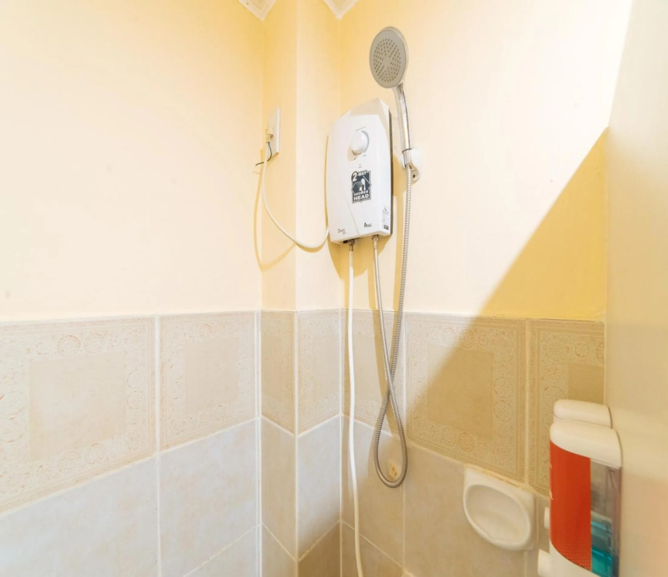 Shower in RedDoorz at Nirvana Pension House