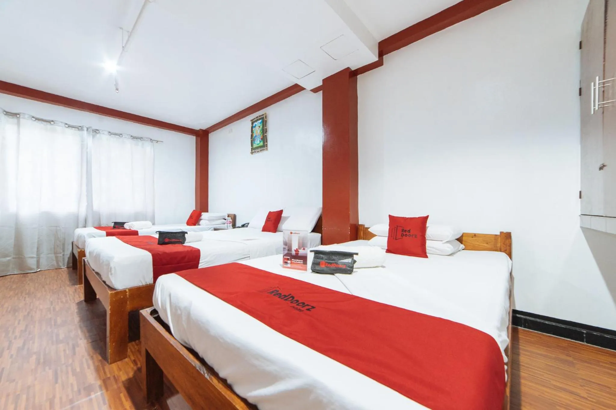 Bed in RedDoorz at Nirvana Pension House