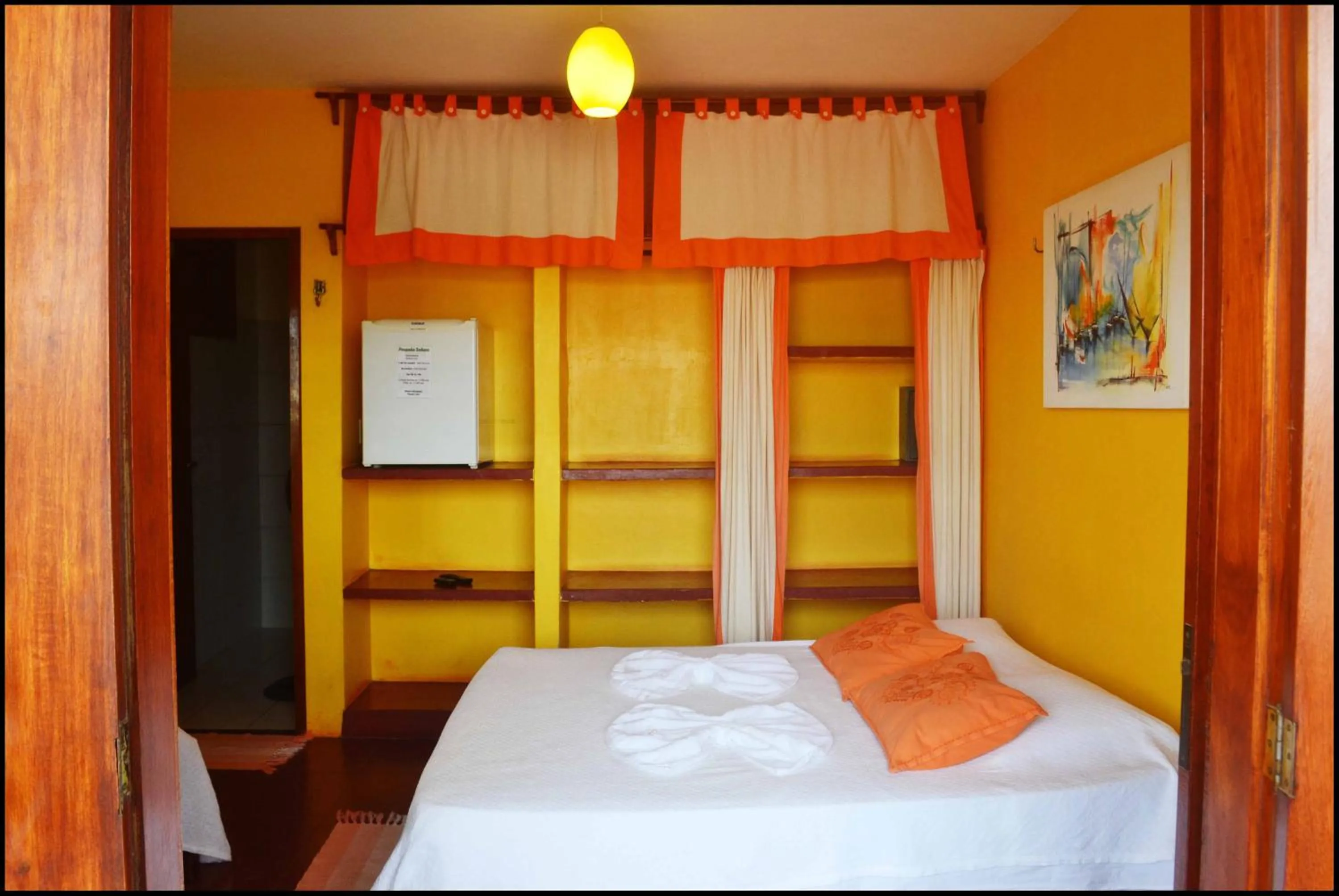 Bed in Pousada Sahara