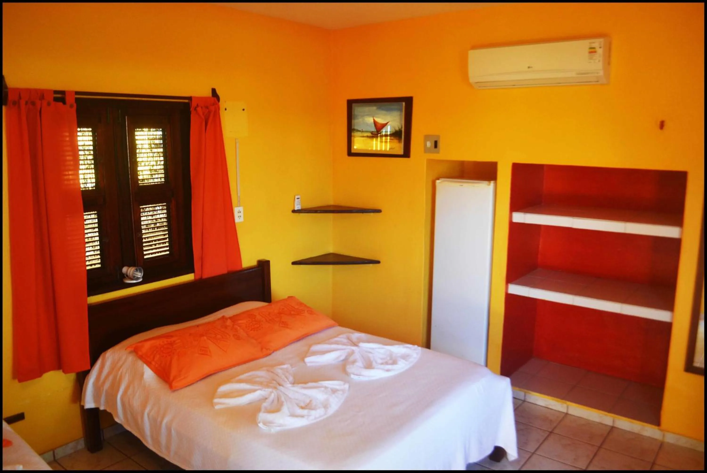 Bed in Pousada Sahara