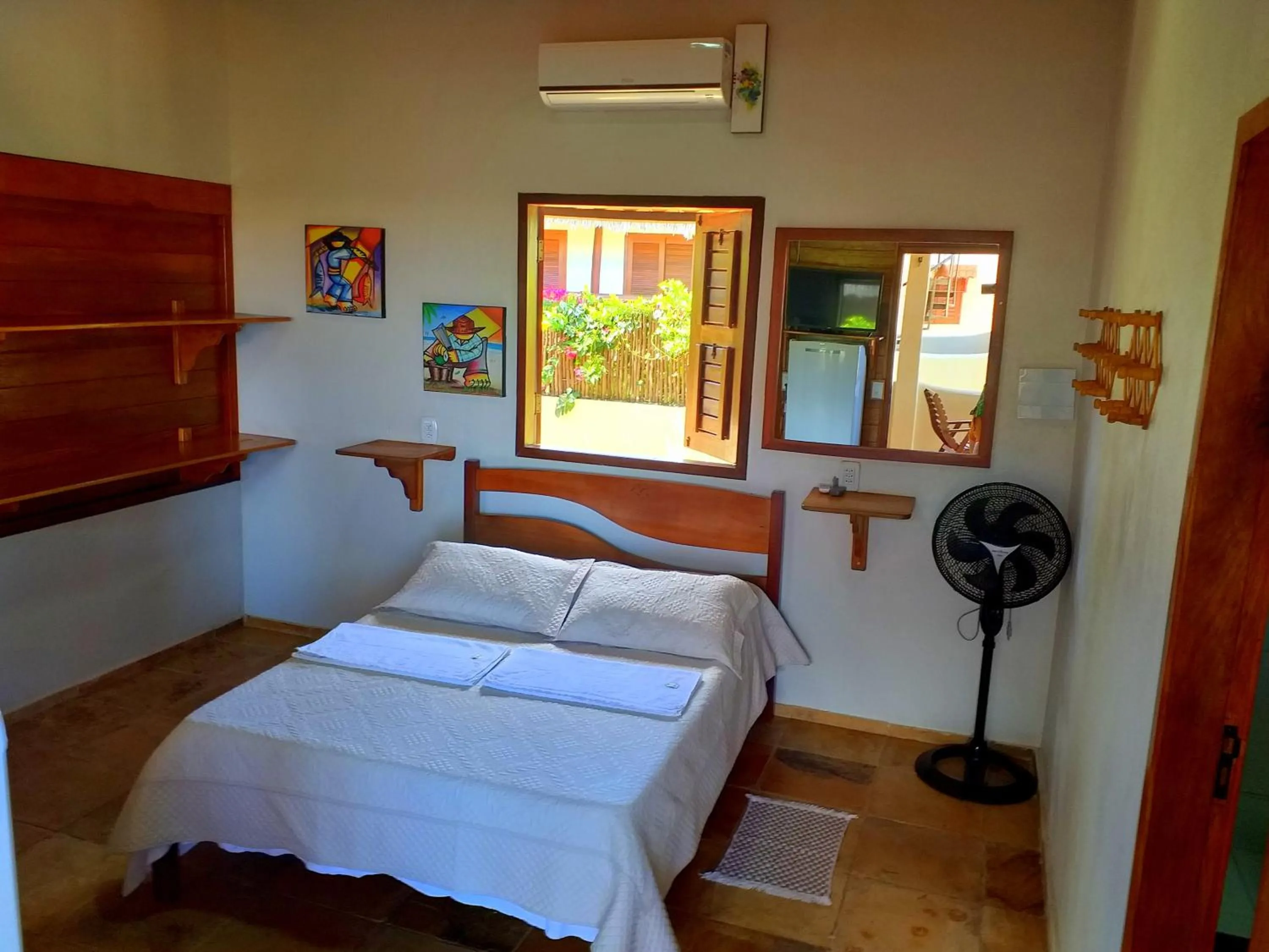 Bed in Pousada Sahara