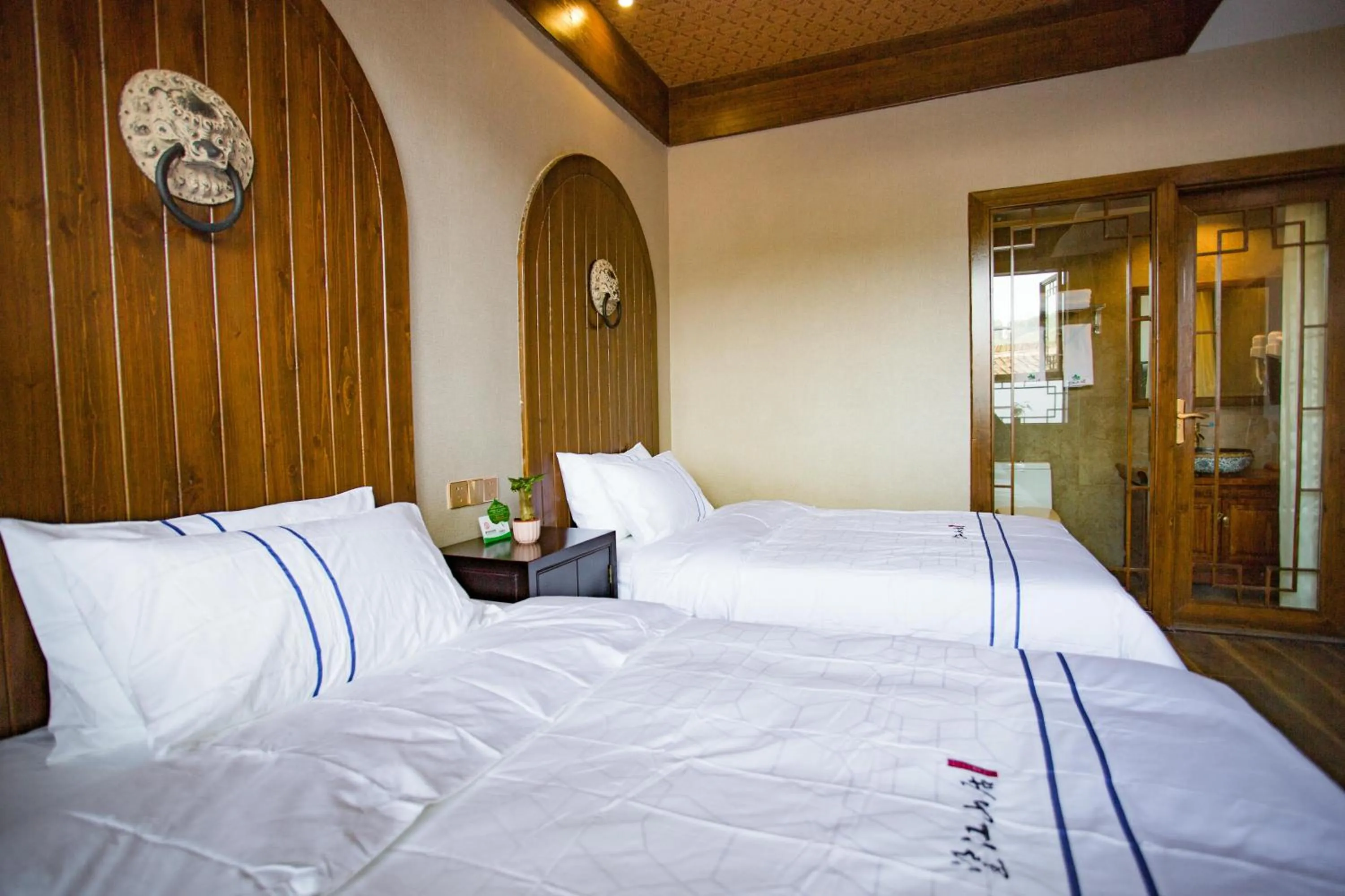 Bed in Wang Jiang Reclusive Boutique Inn