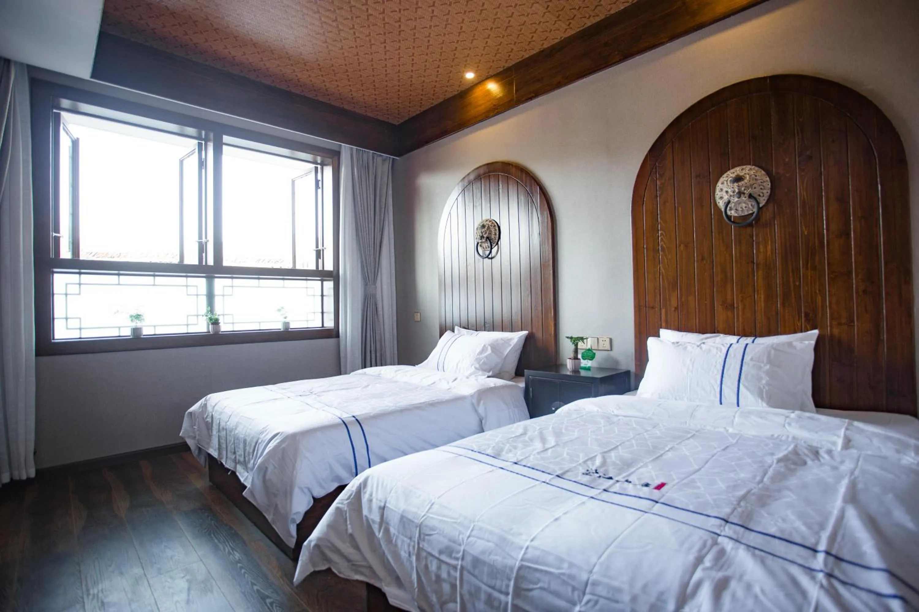 Bed in Wang Jiang Reclusive Boutique Inn