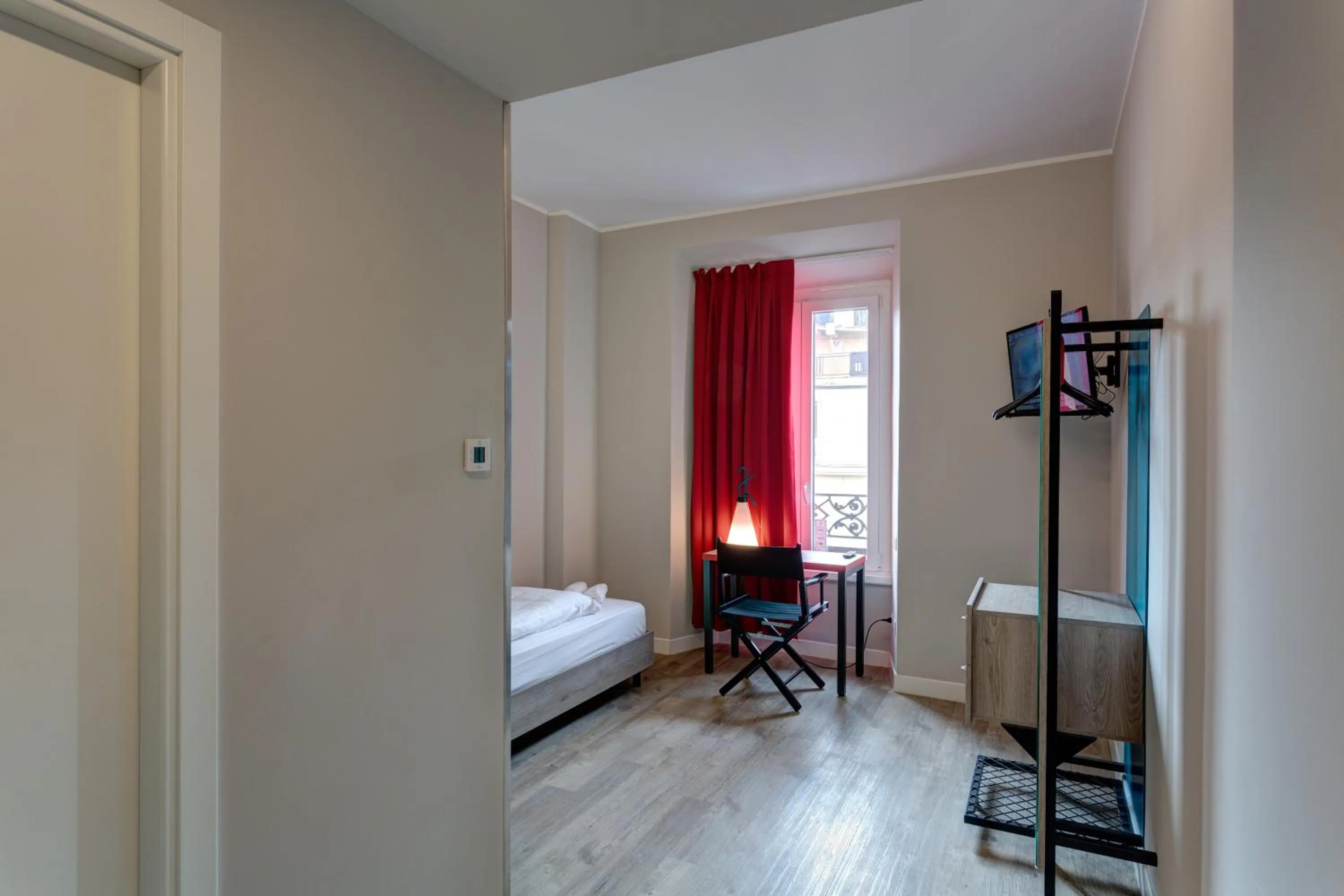 Photo of the whole room, Bed in MEININGER Roma Termini