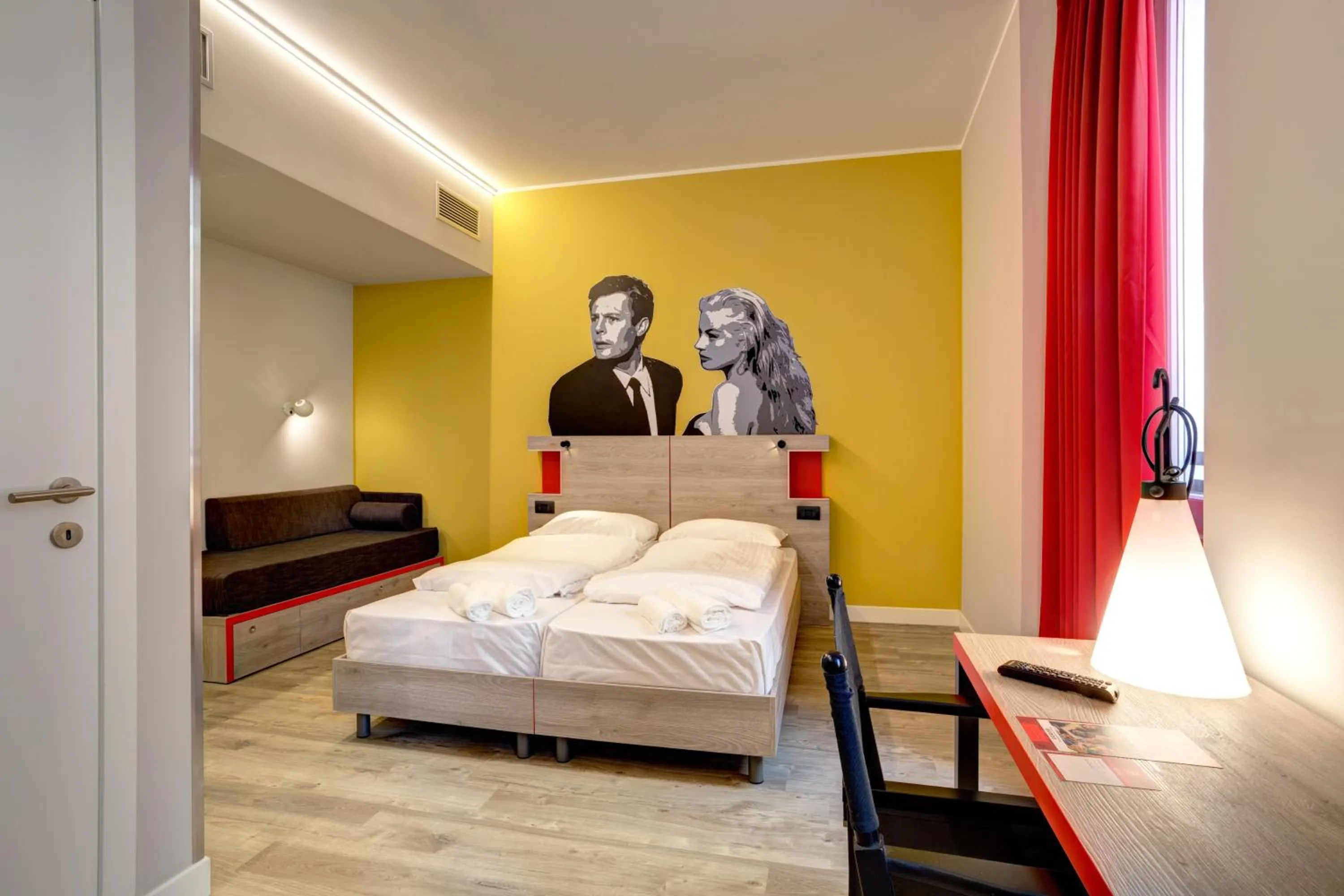 Photo of the whole room, Bed in MEININGER Roma Termini