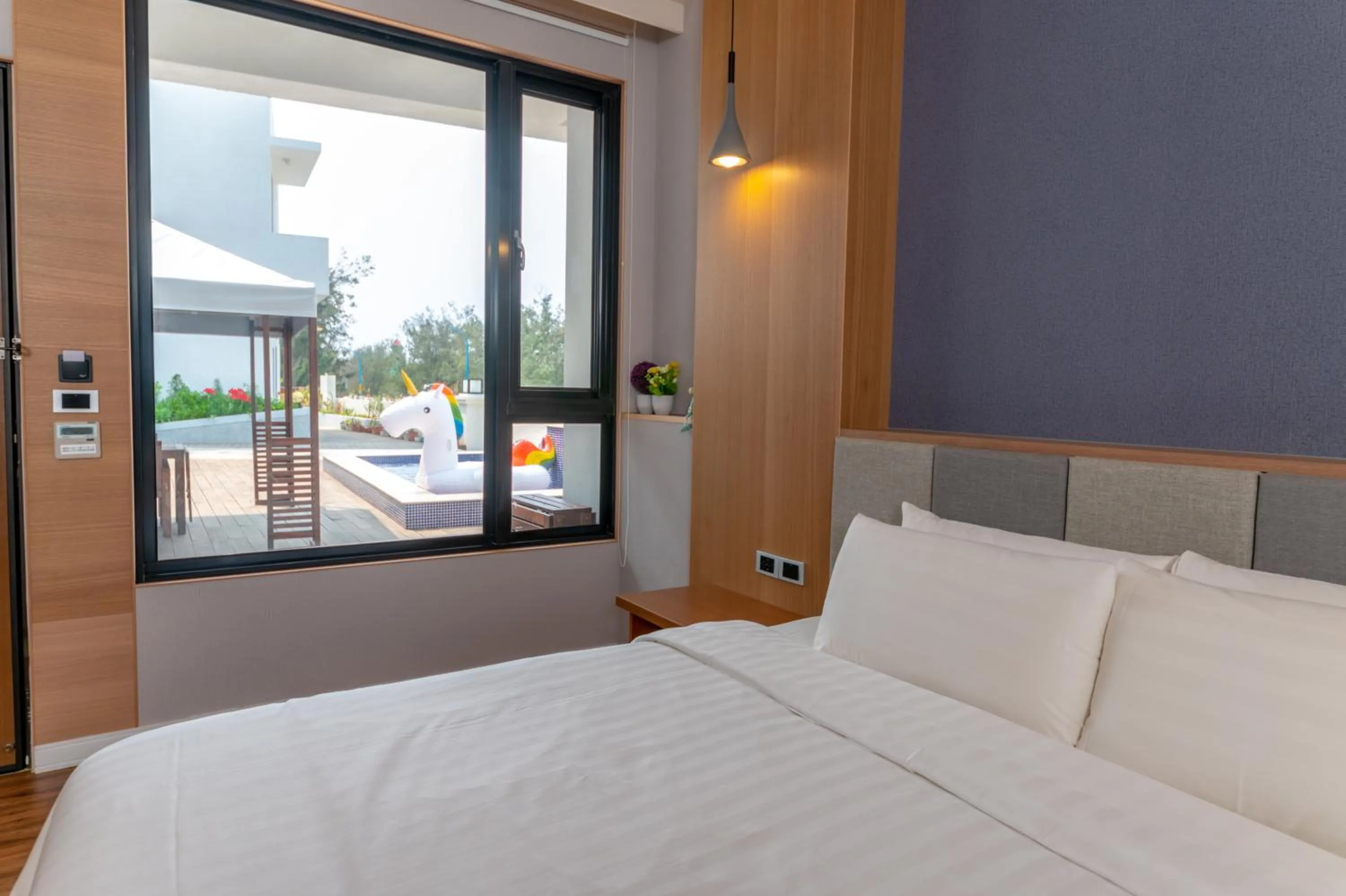 Bed in Sunshine Palm B&B