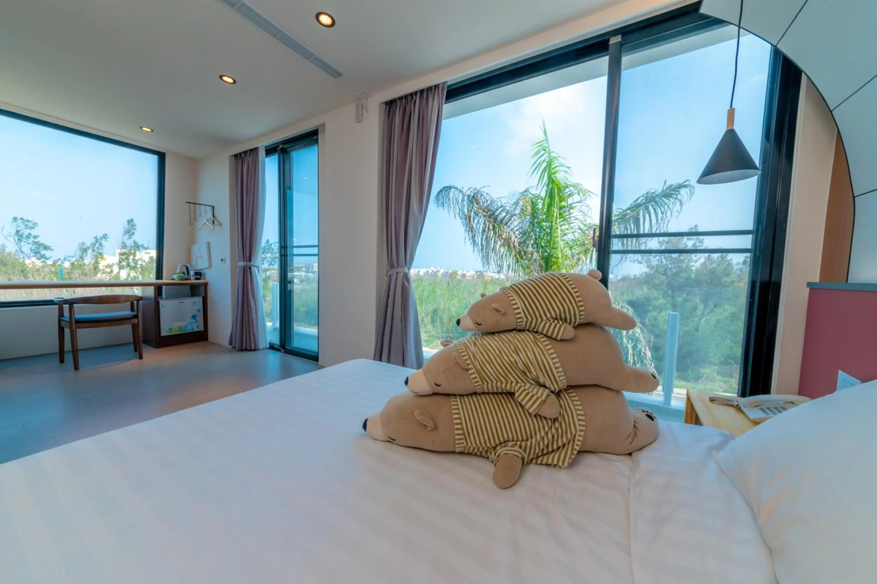 Bed in Sunshine Palm B&B