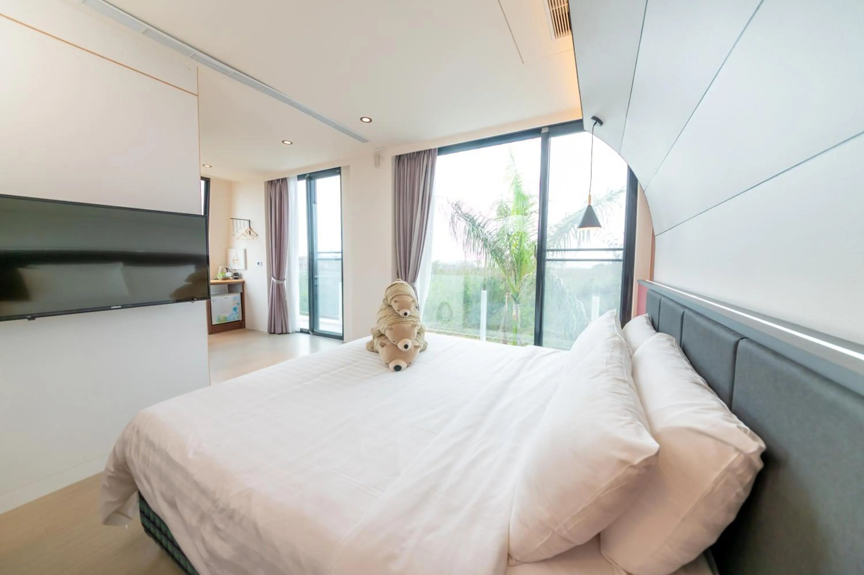 Bed in Sunshine Palm B&B