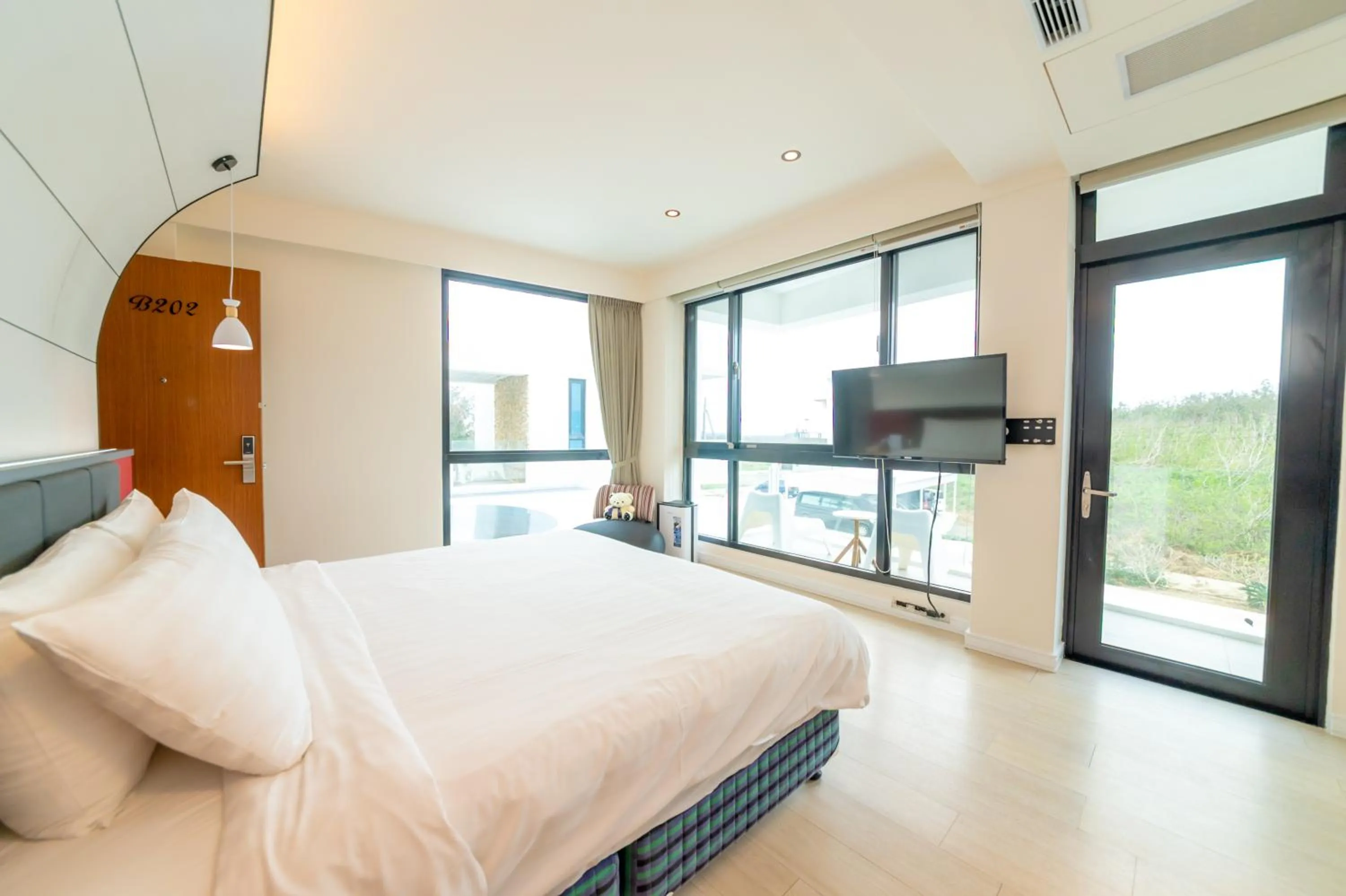 Bed in Sunshine Palm B&B