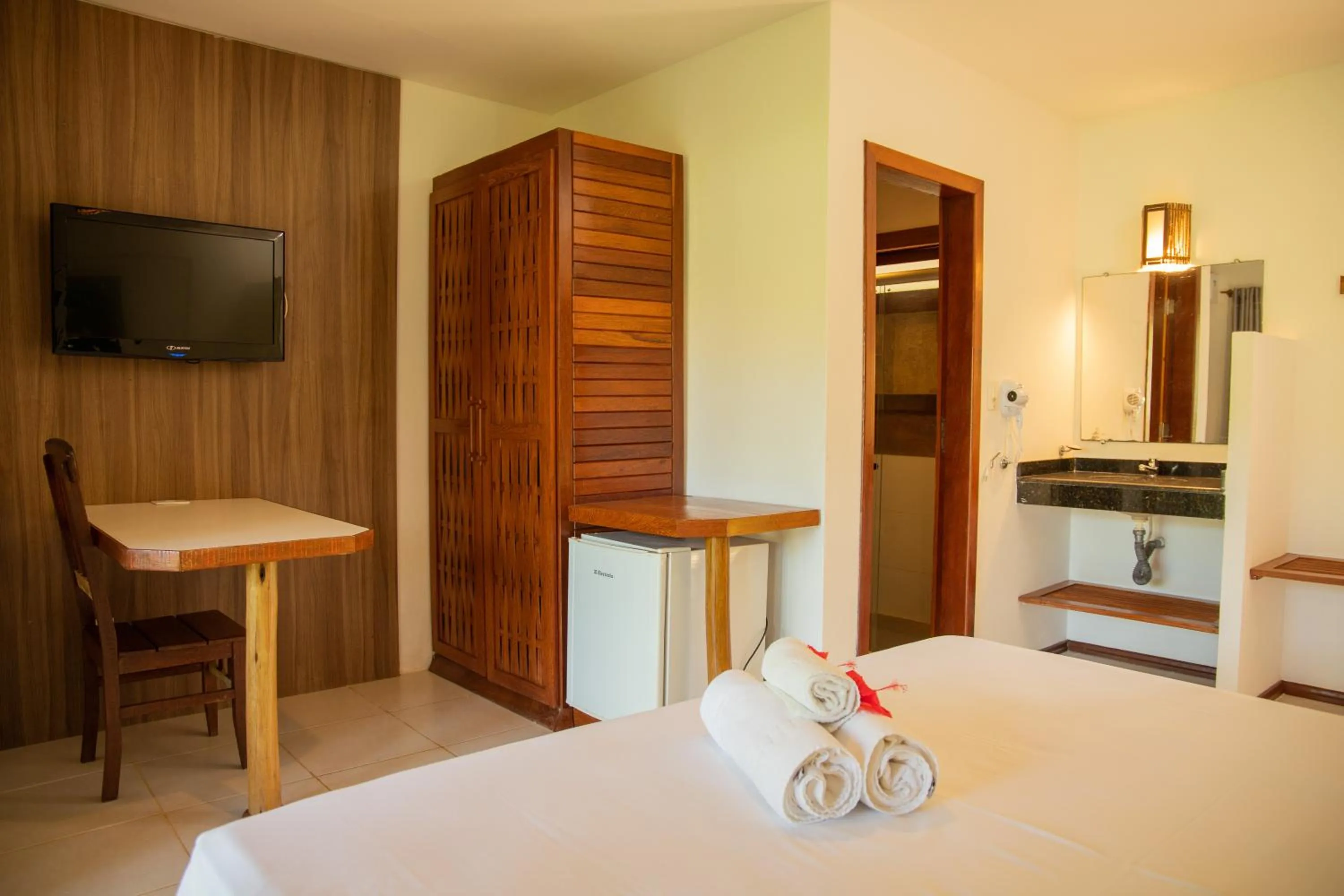 Photo of the whole room, Bed in Pousada Vila do Dengo