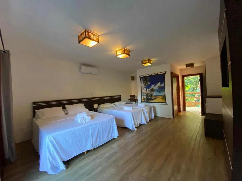 Bed in Pousada Vila do Dengo