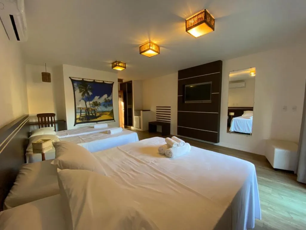 Bed in Pousada Vila do Dengo