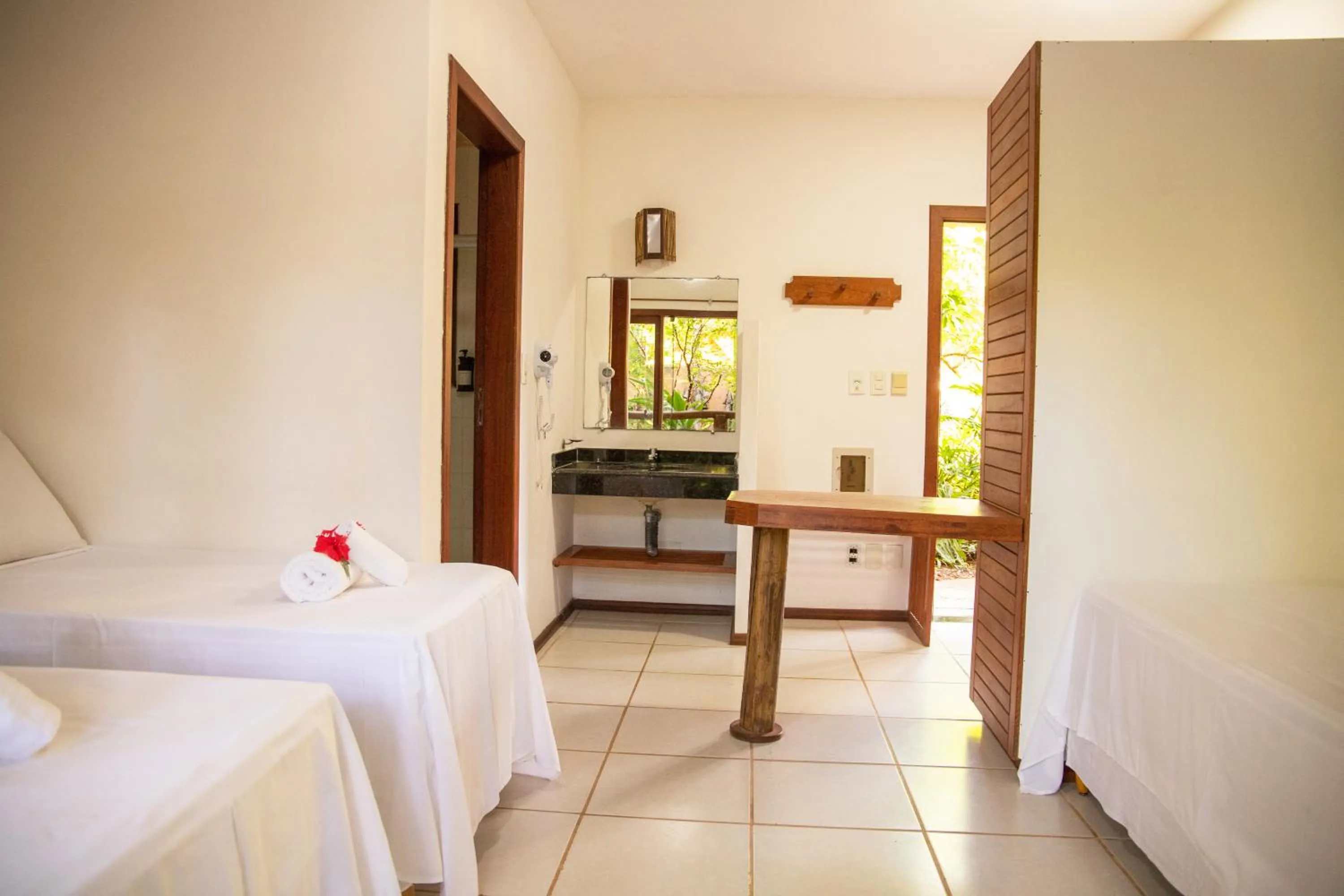 Photo of the whole room, Bed in Pousada Vila do Dengo